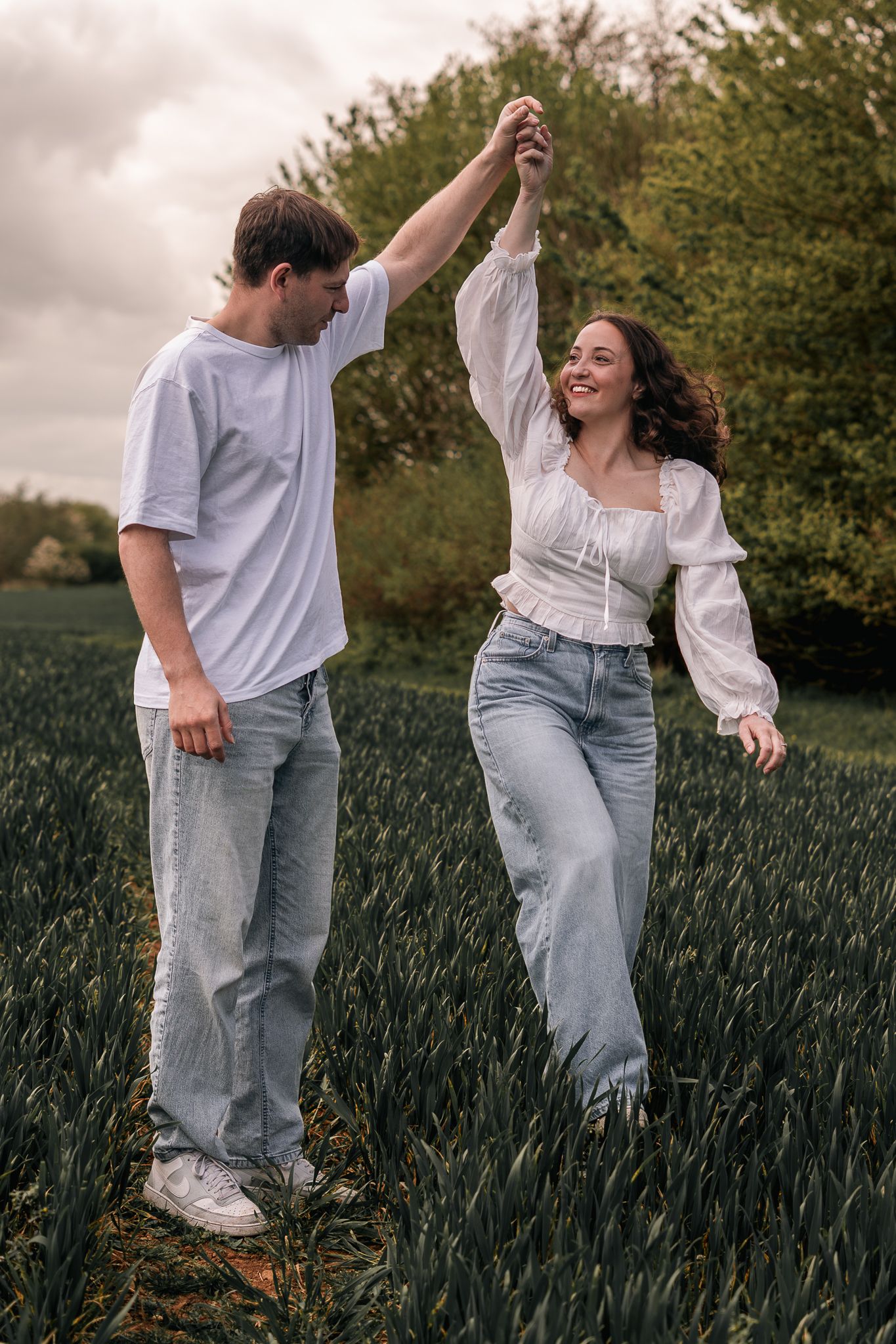 couple dancing during their engagement shoot, taken by a Yorkshire wedding photographer In east Yorkshire