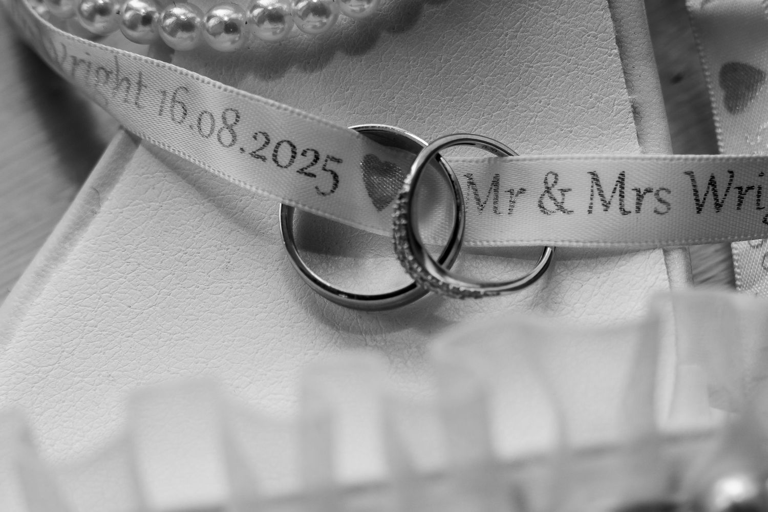 Black and white photo of rings at Lazaat Hotel, captured by an East Yorkshire wedding photographer