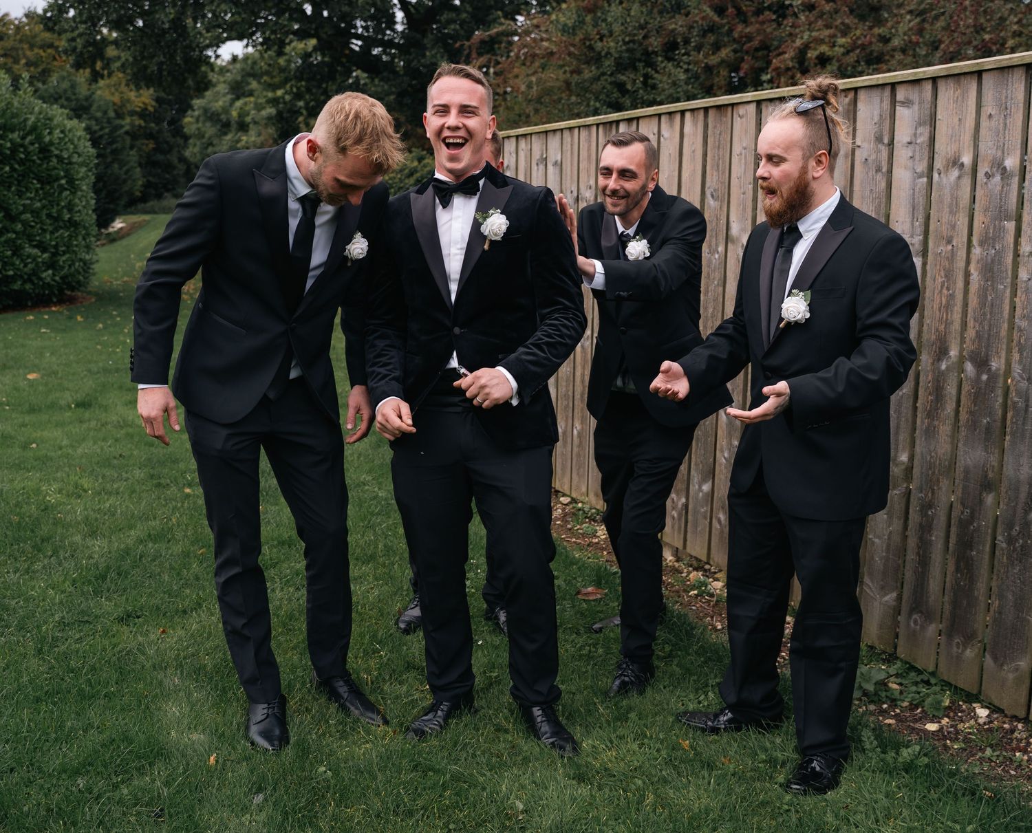 Groomsmen laughing candidly at Lazaat Hotel in Cottingham – captured by Yorkshire documentary wedding photographer