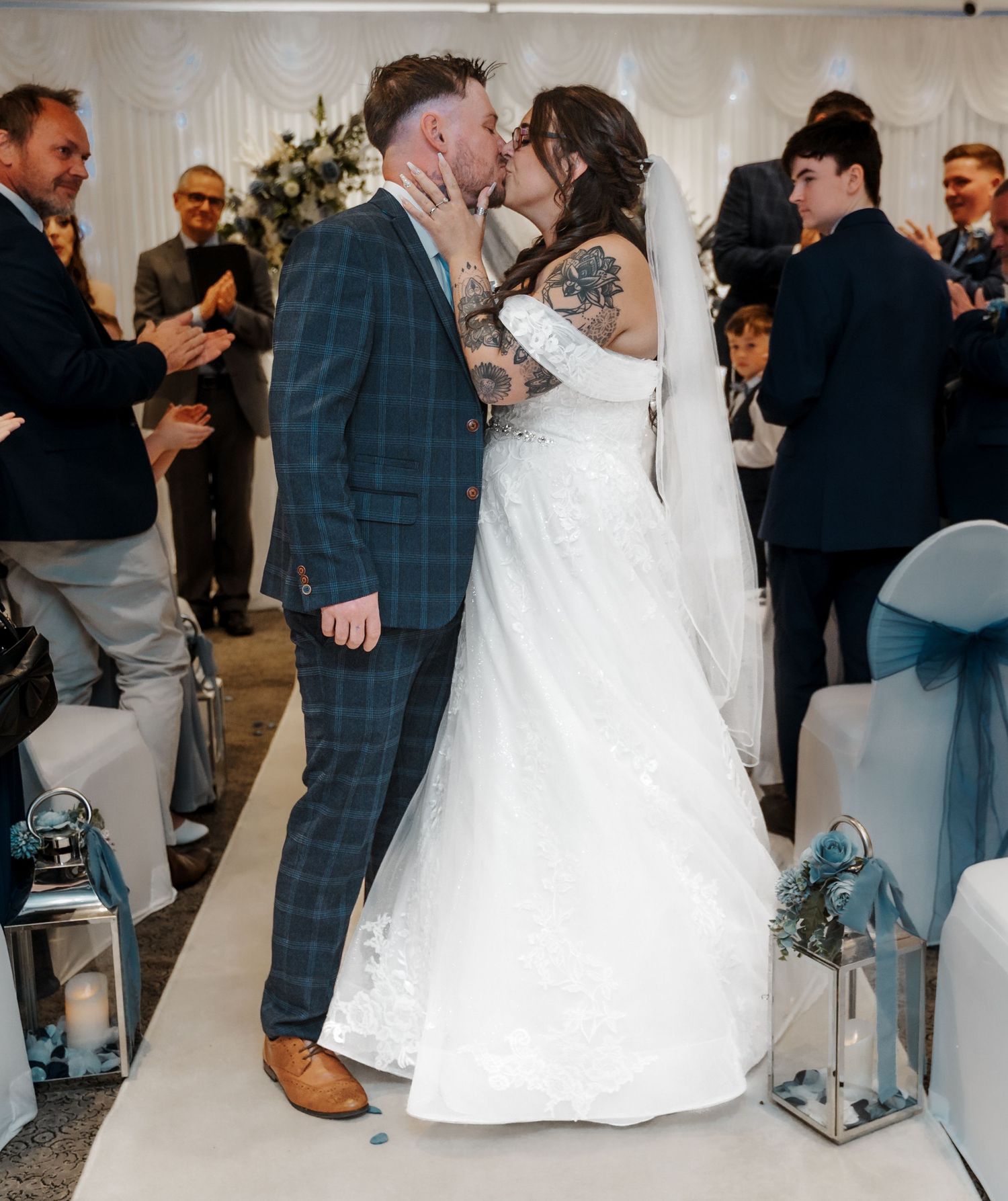 Bride and groom Kiss at the aisle at the Gardeners country inn, captured by a candid East Yorkshire wedding Photographer