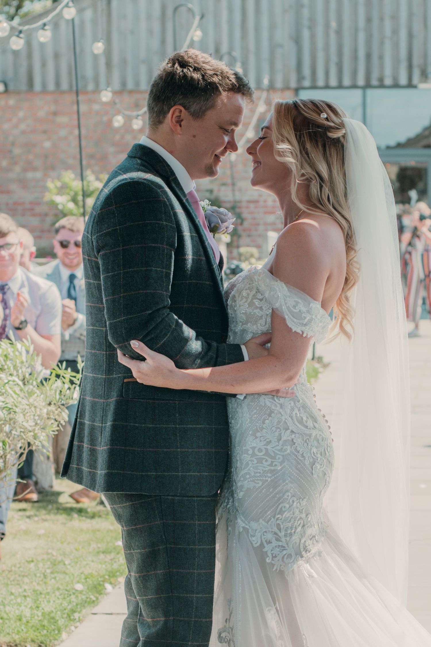 Bride and groom at their ceremony at The Beverley barn, captured by a documentary wedding Photographer in Beverley