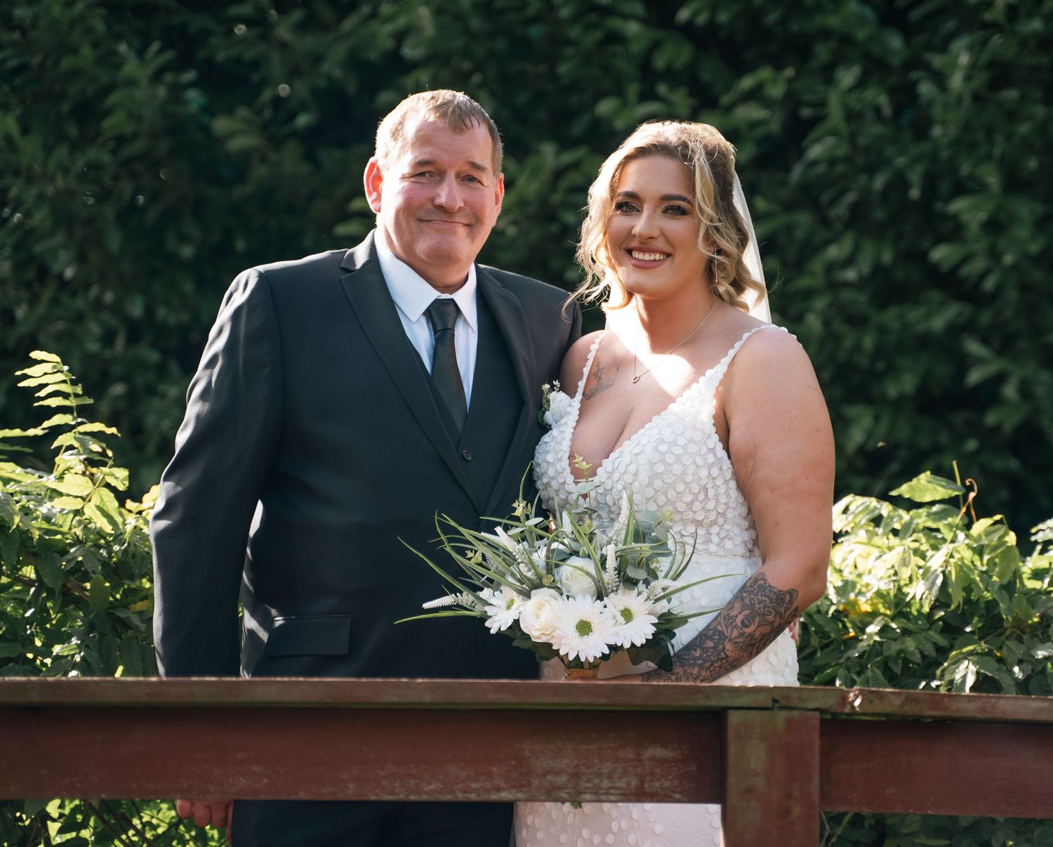 Bride and her dad on the bridge at Lazaat hotel in Cottingham