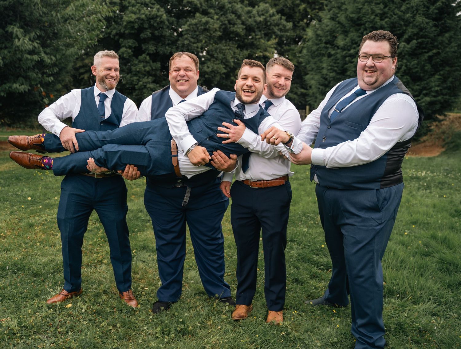 Groom and his groomsmen at Lazaat Hotel, captured by a documentary style wedding photographer in Hull