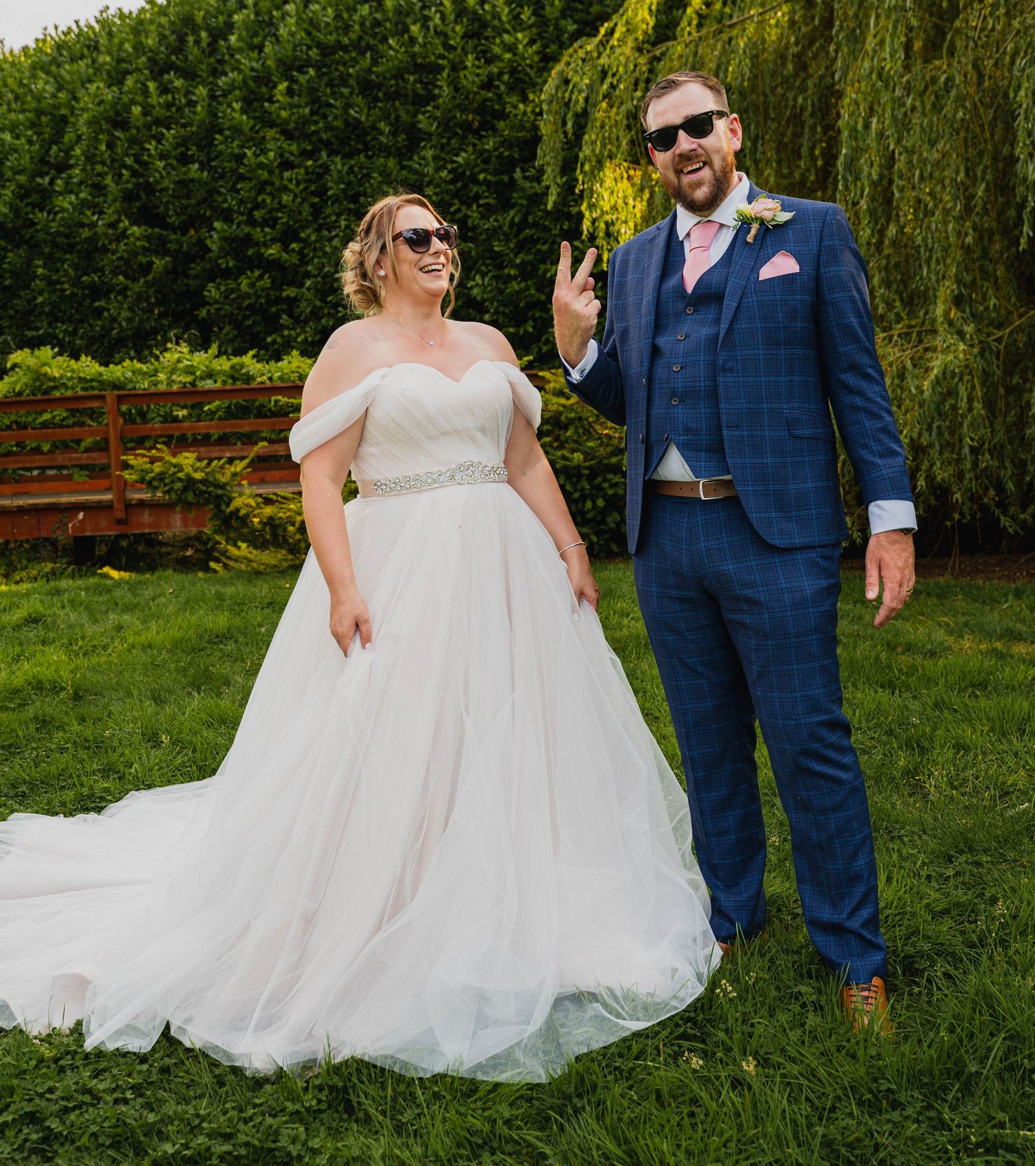 Bride and groom sharing a playful moment wearing glasses at Lazaat Hotel – captured by Hull documentary wedding photographer