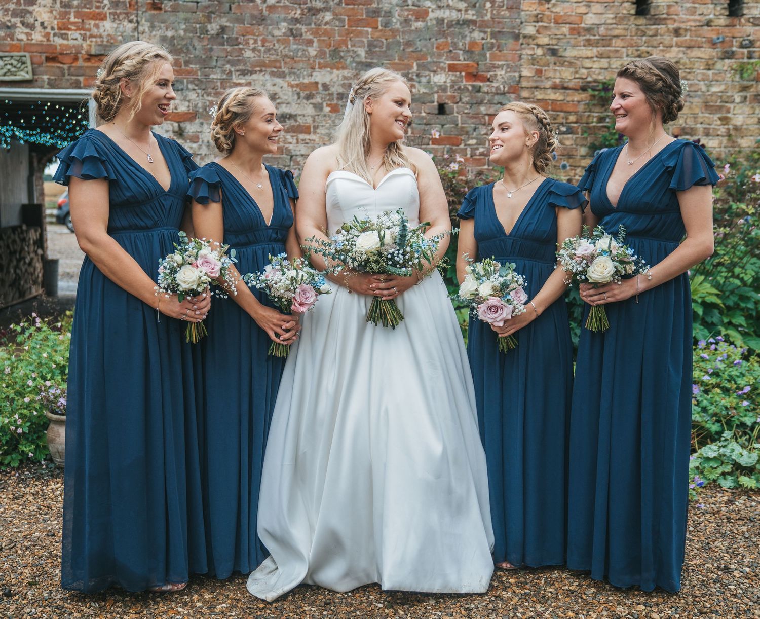 Bride and bridesmaids at Barff house country weddings, captured by a candid wedding photographer.