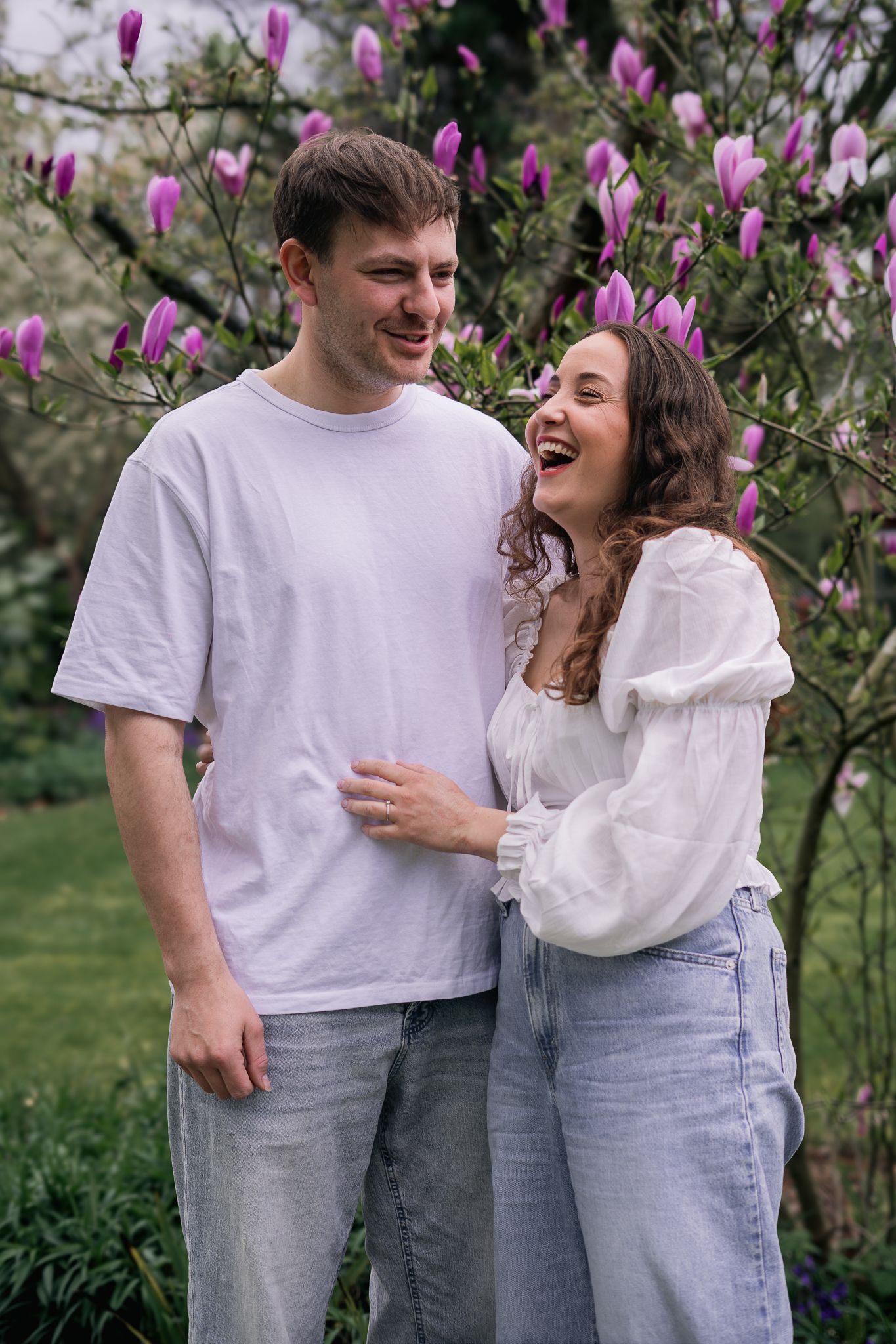 couple laughing and having fun during their engagement shoot, taken by a Yorkshire wedding photographer In east Yorkshire