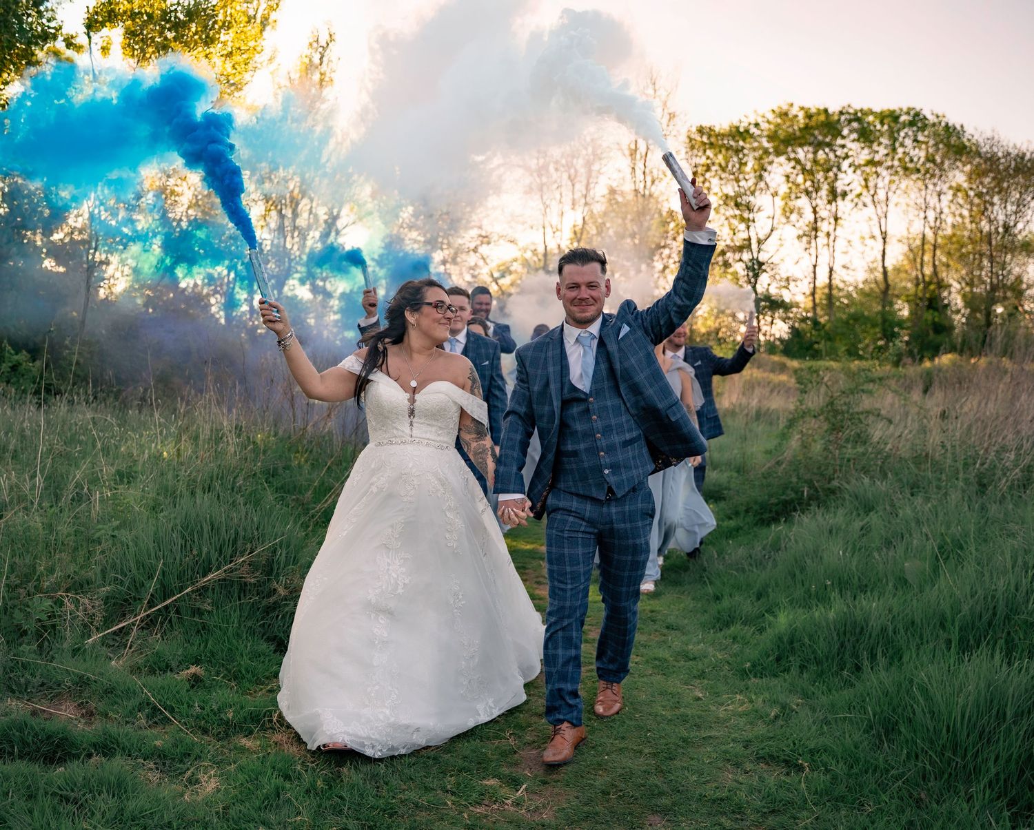 Bride and groom portrait with Coloured smoke grenades at the Gardeners country inn, captured by a candid East Yorkshire wedding Photographer
