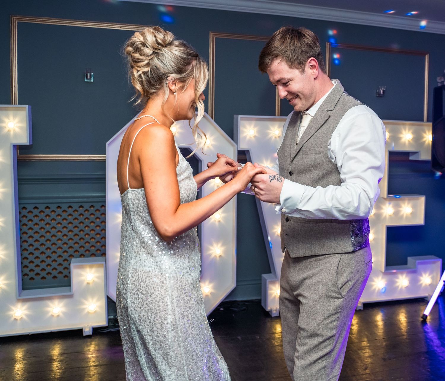 Bride and grooms first dance at The gardeners country inn, captured by a candid wedding photographer.