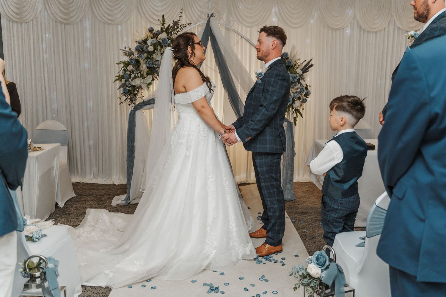 Brides and groom during their ceremony at the Gardeners country inn, captured by a candid East Yorkshire wedding Photographer