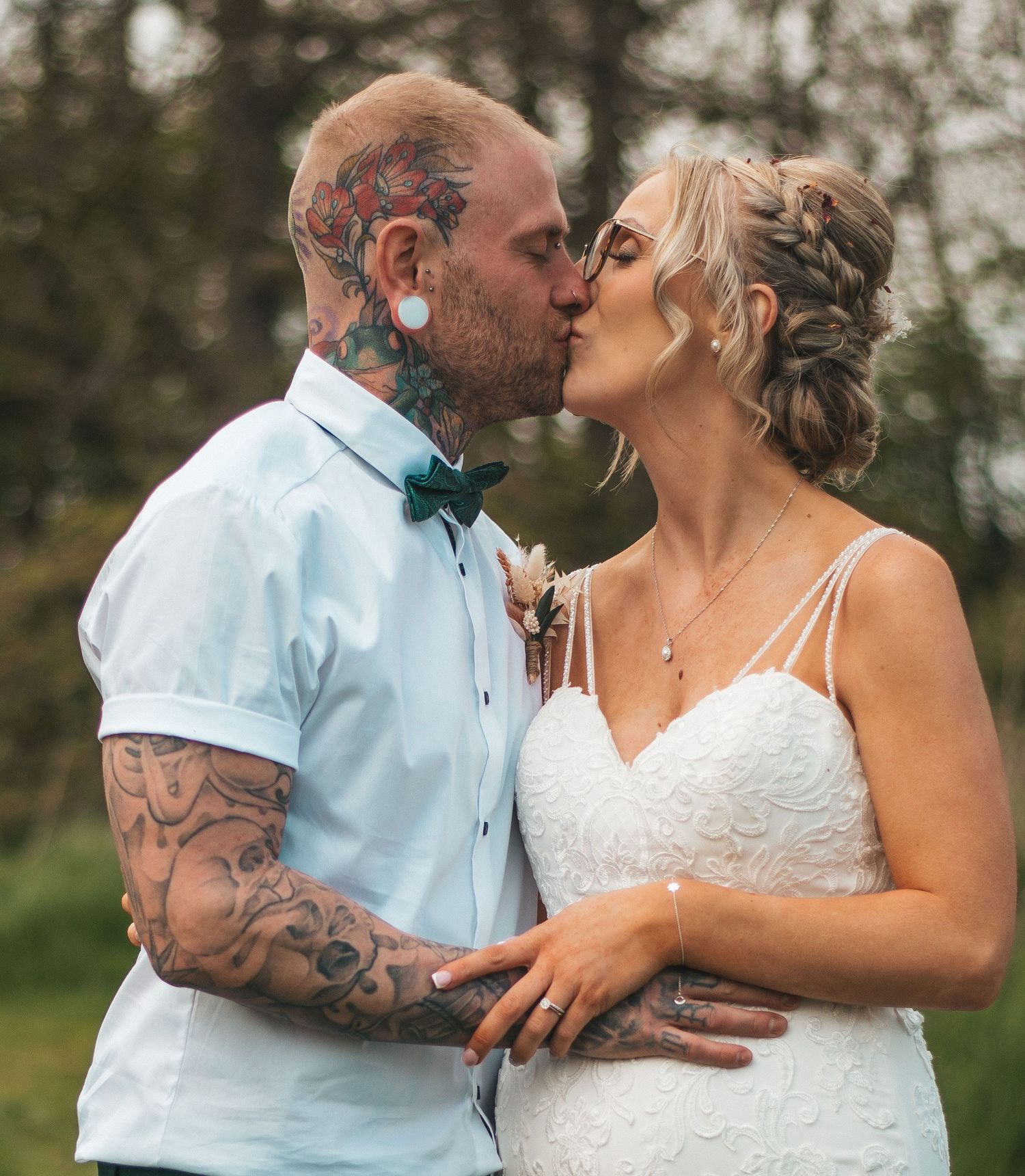 Bride and groom sharing a kiss at The Gardeners Country inn, captured by a documentary wedding photographer in East Yorkshire
