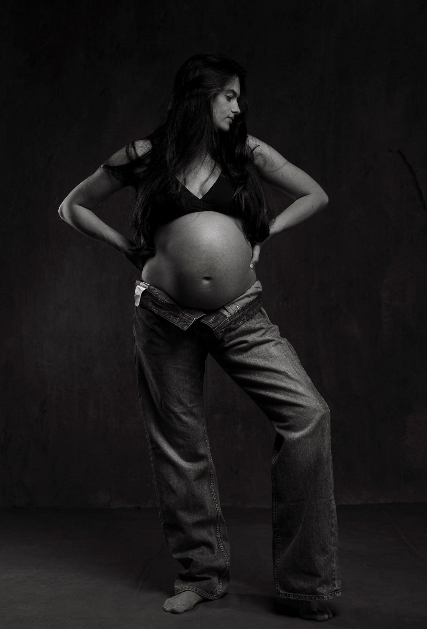 Creative black and white maternity poses showing movement and form.