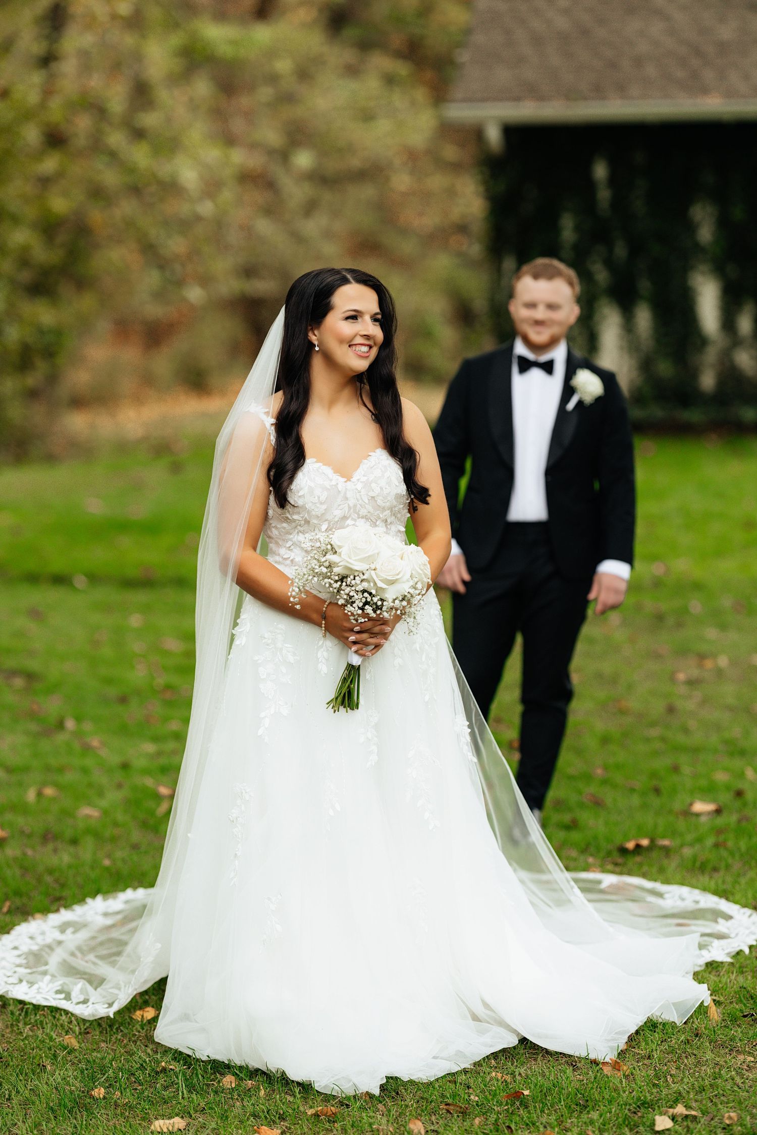 Bride and groom on their wedding day posing for a photo.