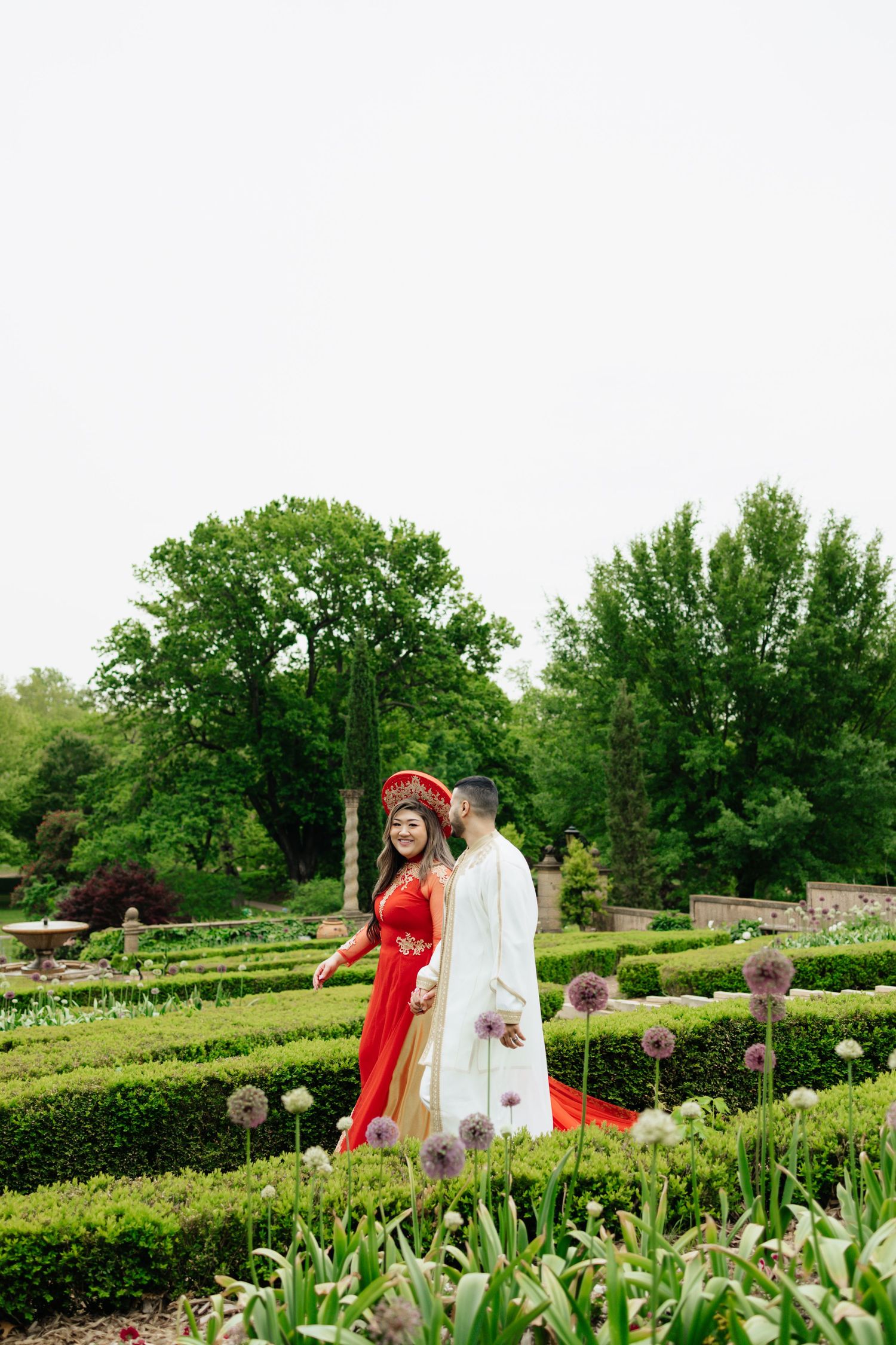 Vietnamese engagement session. Mix of cultures. Bride and groom. Moroccan groom . Garden engagement session. Philbrook museum Tulsa, ok