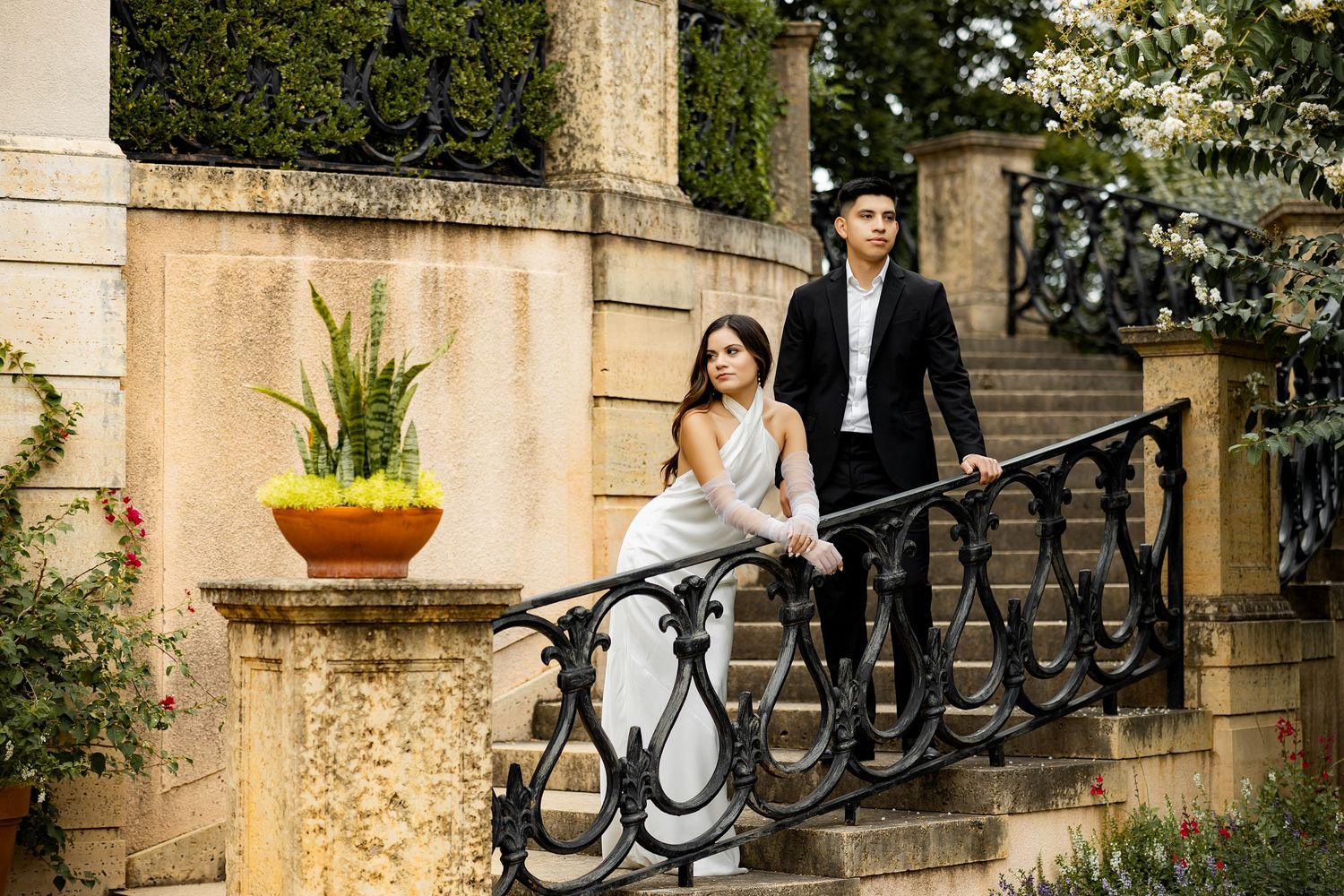 Bride and groom posing in an editorial manner during their engagement session.