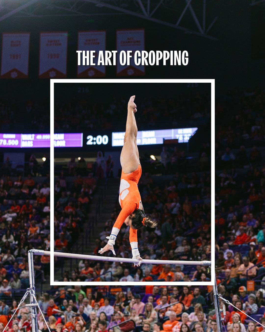 Gymnast performs a handstand on parallel bars during a competition in an arena with orange-colored seating.
