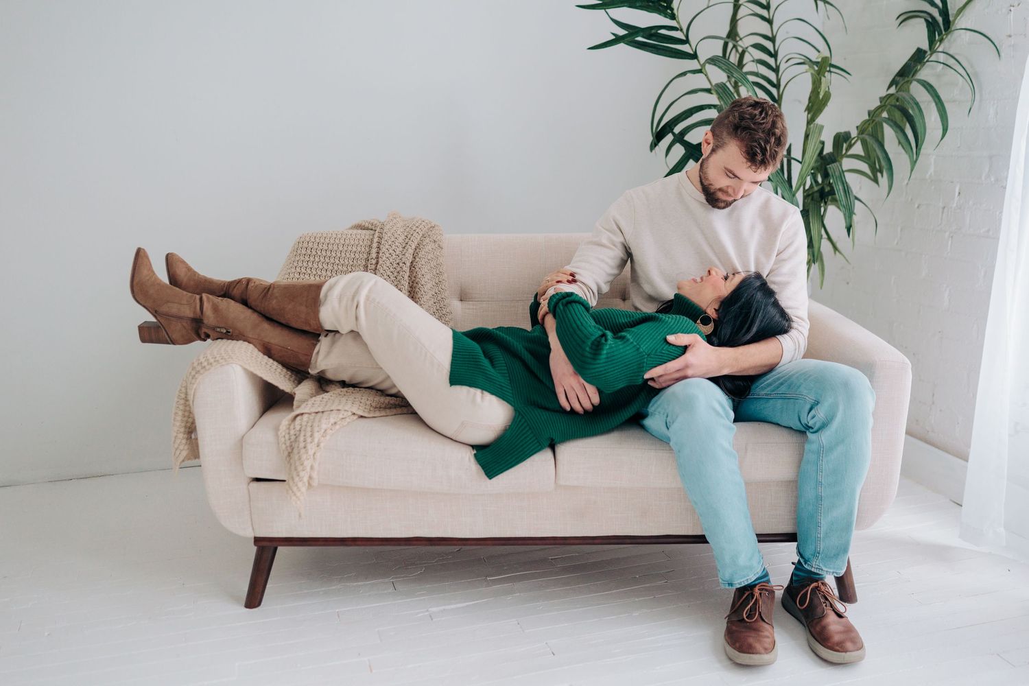 A series of photos showing someone lounging on a beige couch in different relaxed positions.