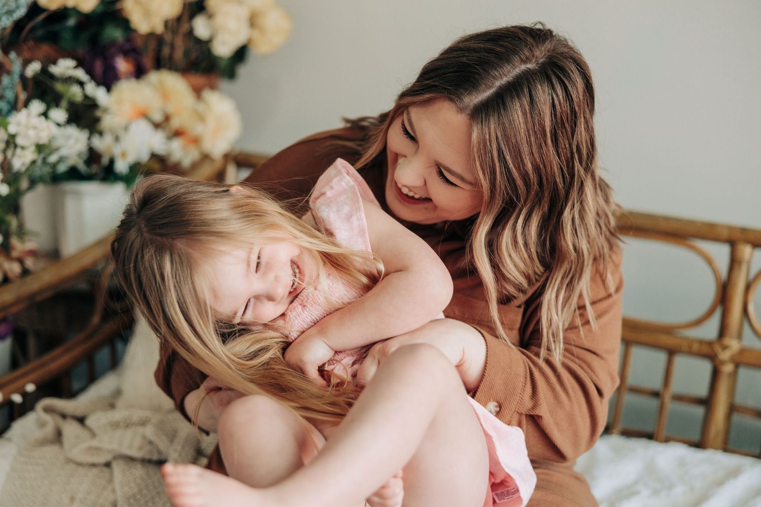 Tender family moment captured during indoor lifestyle photo session.
