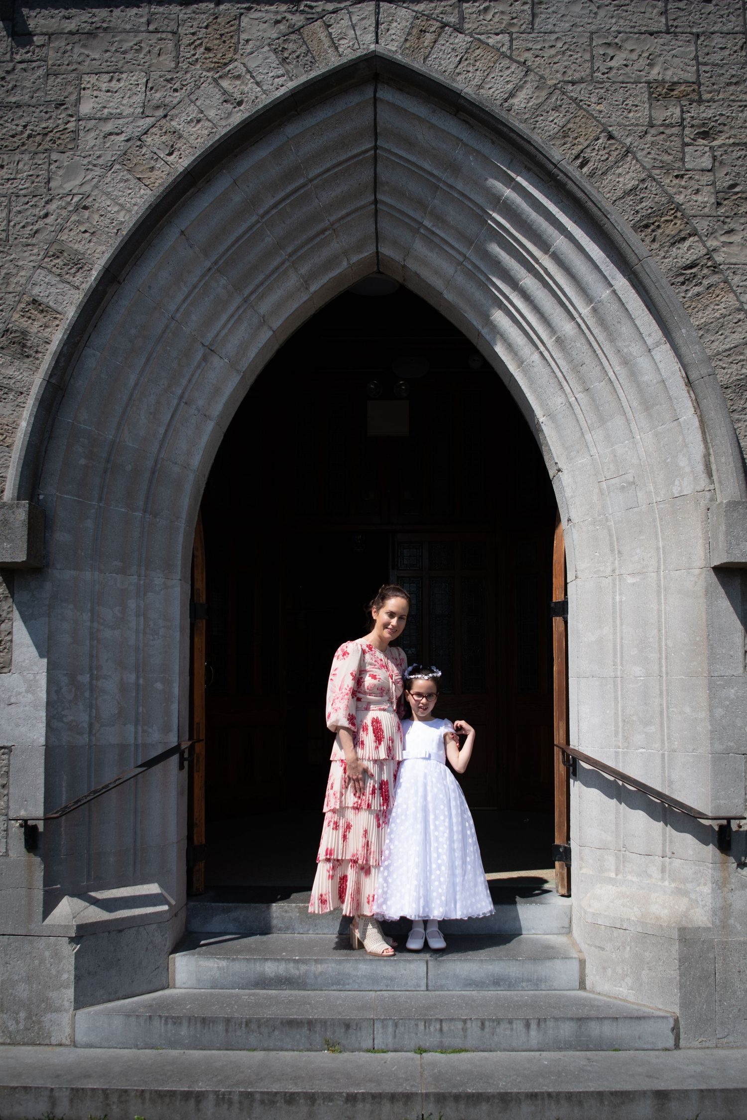 Series of photos showing people in stone archways of a gothic-style building.