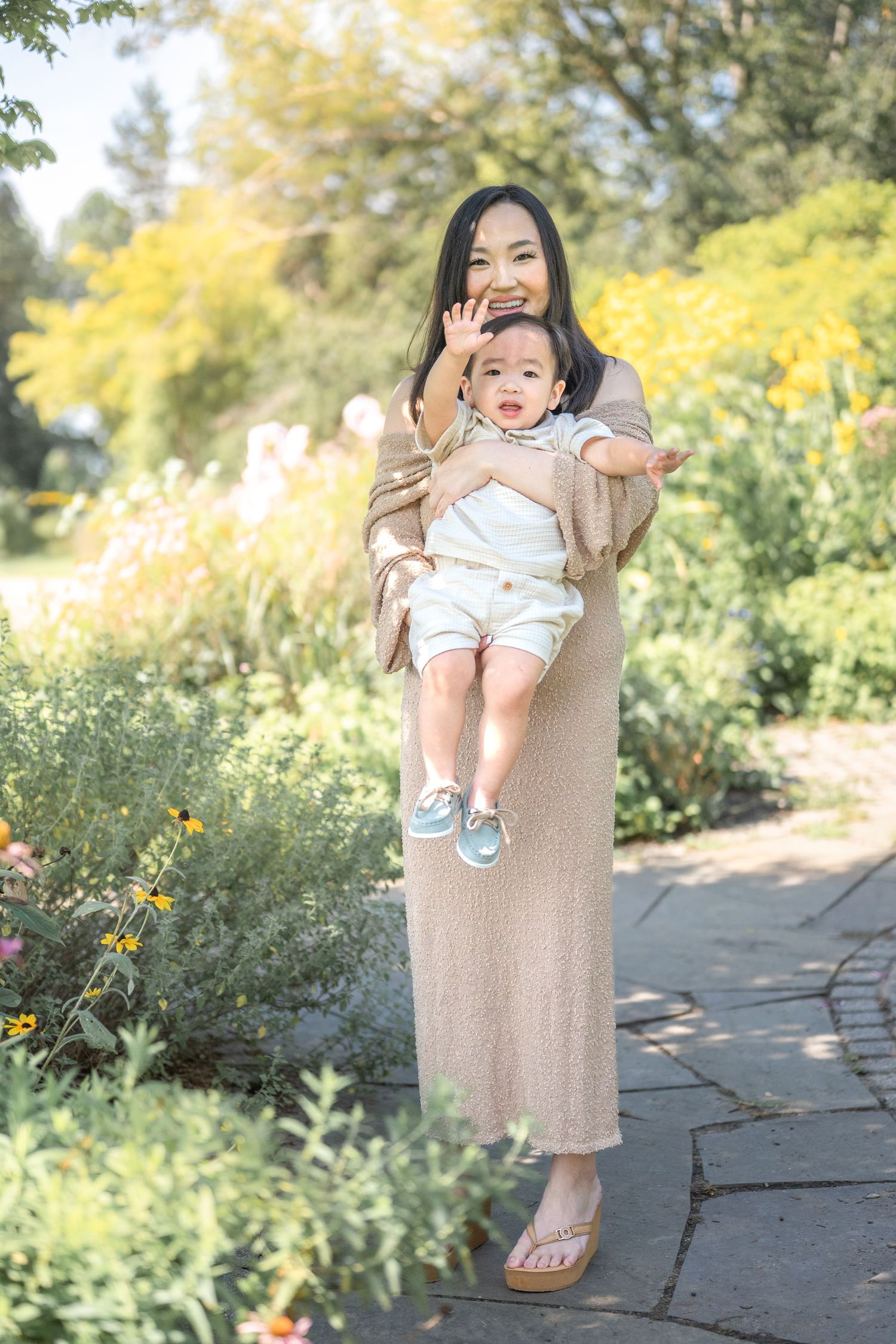 Four photos showing joyful outdoor moments against a backdrop of yellow autumn foliage in a garden setting.