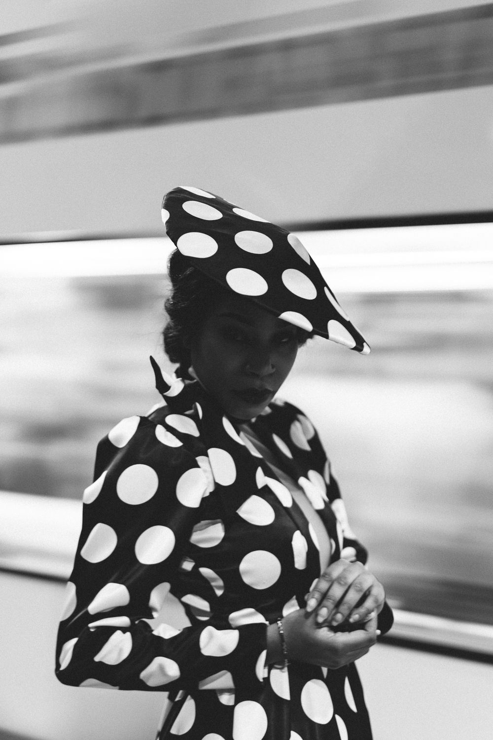 Black and white portrait with polka dot pattern and geometric lines, Seattle outdoor 35mm film photography with editorial fashion styling