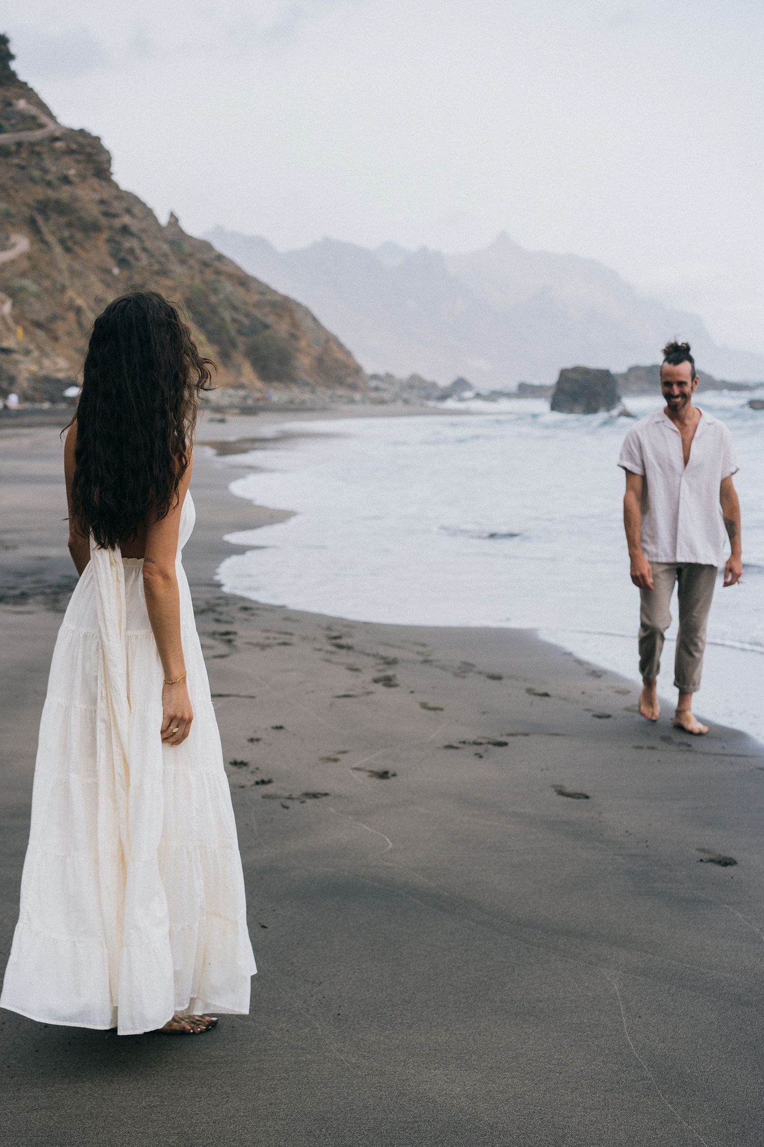 Tenerife engagement photography capturing intimate moments on black sand beach - SOLAYA destination wedding photographers