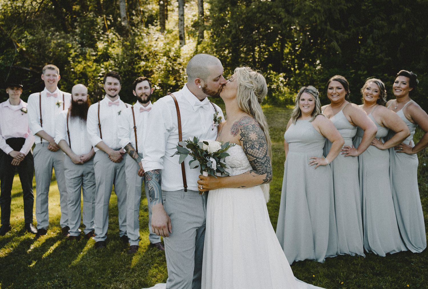 Complete wedding party portrait with bridal party and groomsmen in outdoor setting, cinematic rustic Seattle wedding photography on film