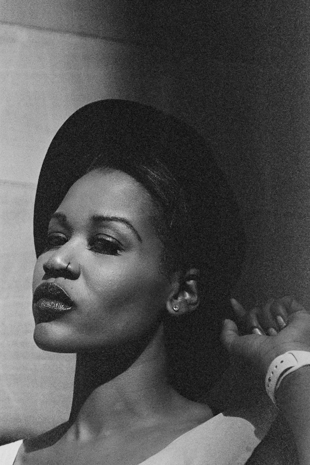Black and white close-up portrait with dramatic side lighting, Seattle film photography with emotive cinematic approach