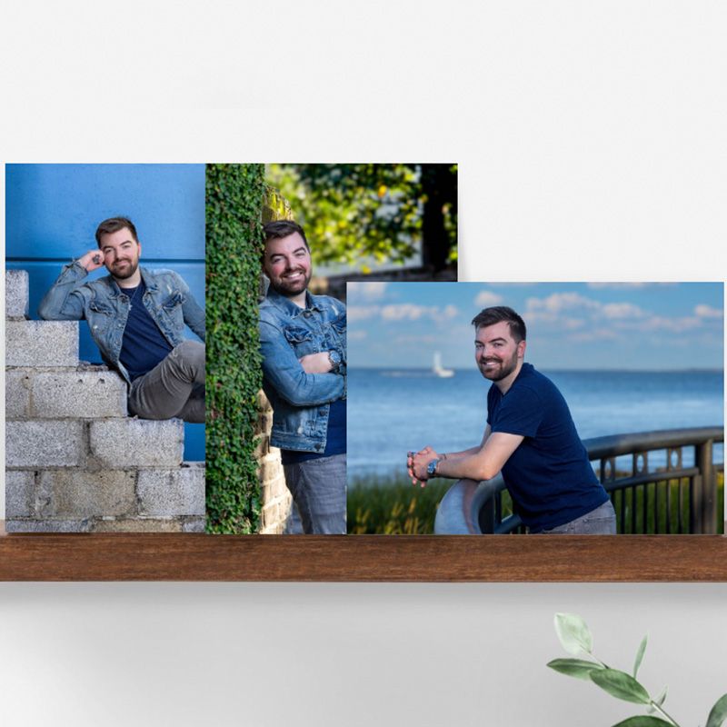 Professional outdoor portrait session at a scenic waterfront location with stone walls and natural lighting.