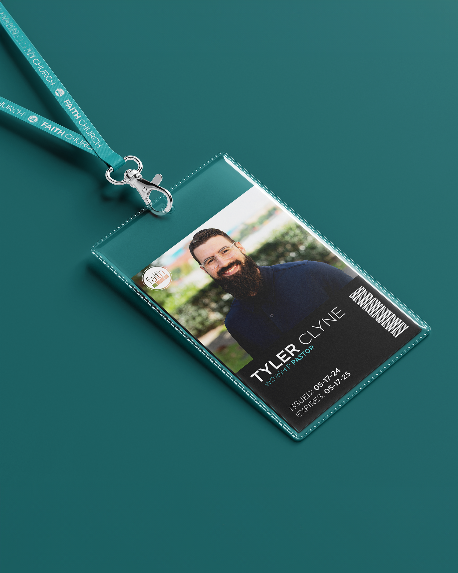 Professional identification card with lanyard on teal background. Portrava Creative Studios