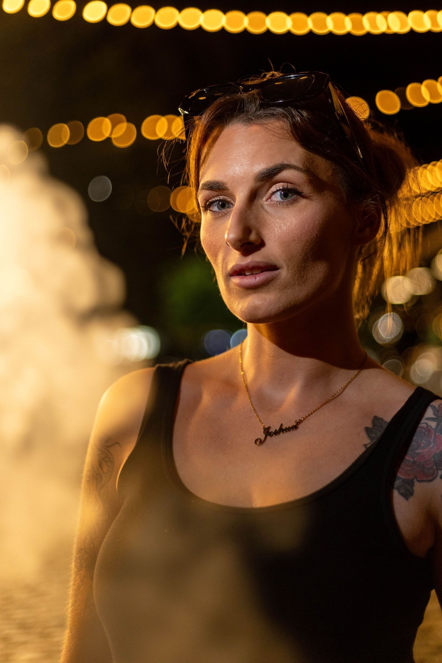 Artistic portrait with bokeh lights and warm evening lighting. Portrava Creative Studios