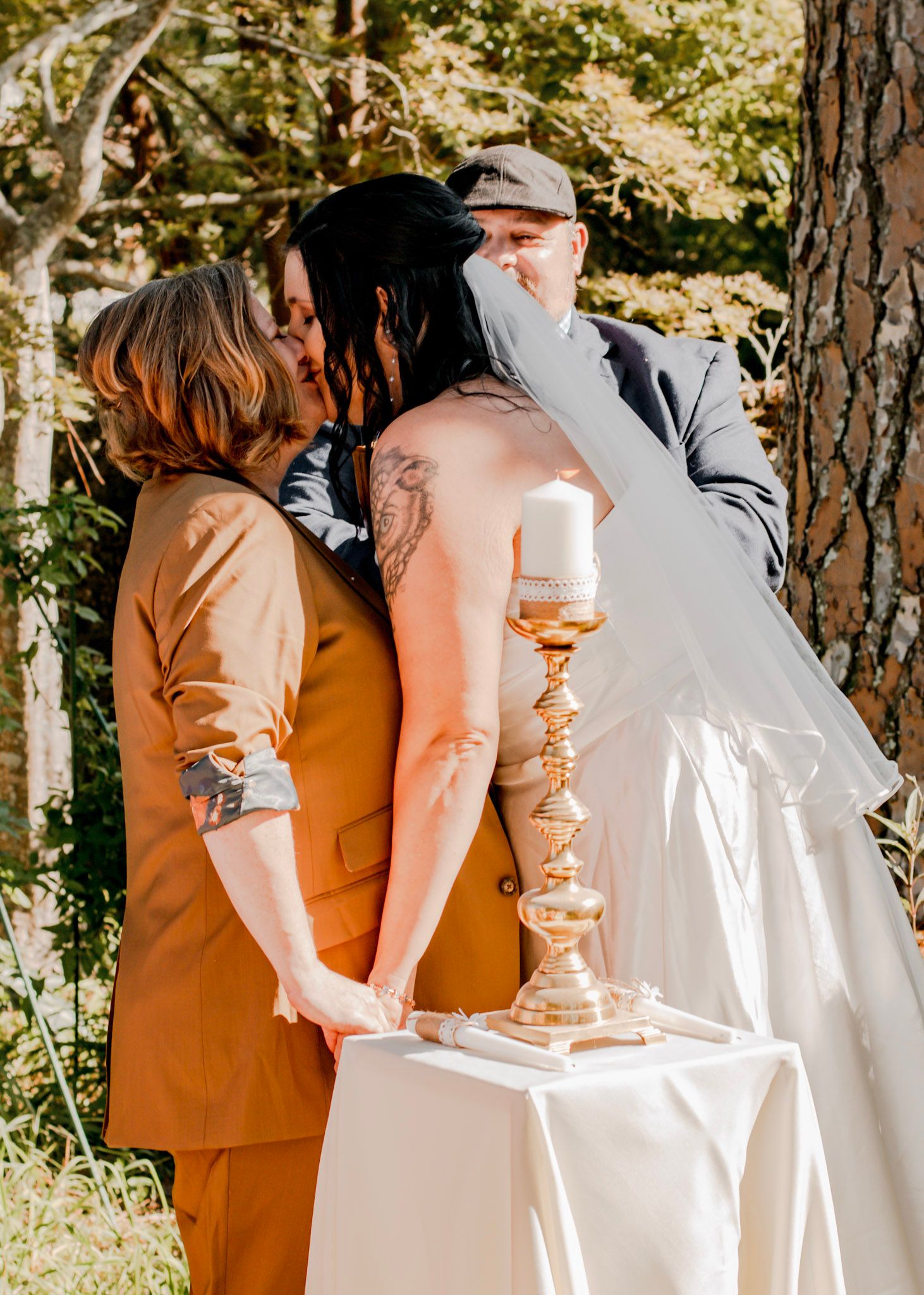 Wedding ceremony first kiss between brides in Albany, Georgia