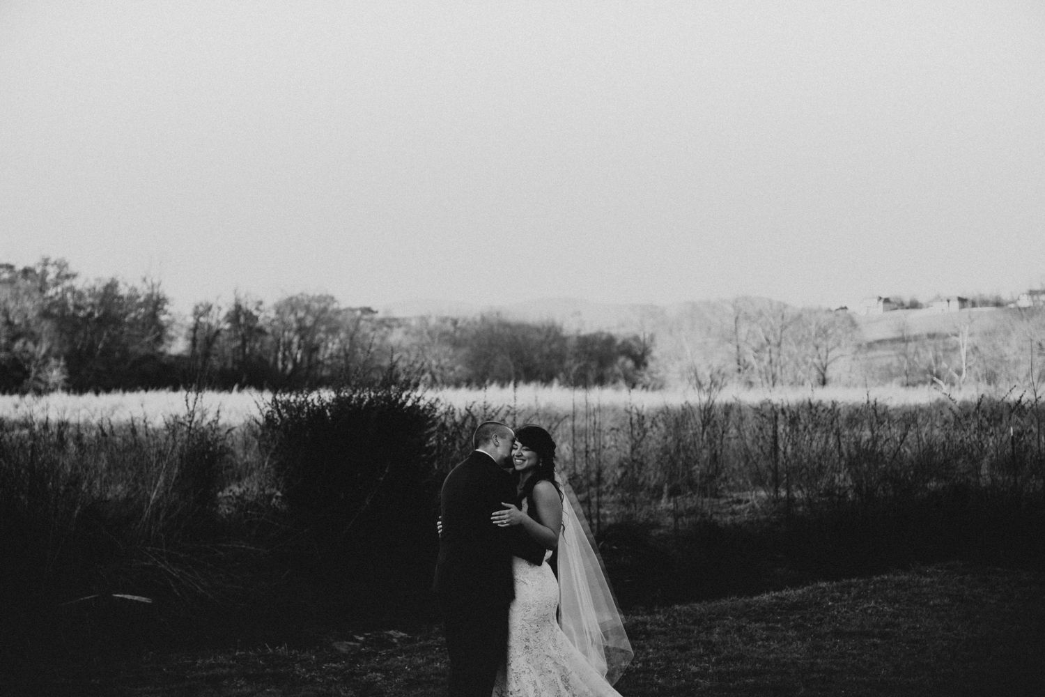 A black and white panoramic view of Emily Hall getting married at Copey Creek, Clarkesville, Georgia