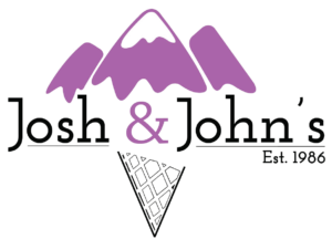 Josh & John's ice cream shop logo featuring purple mountains and a waffle cone.