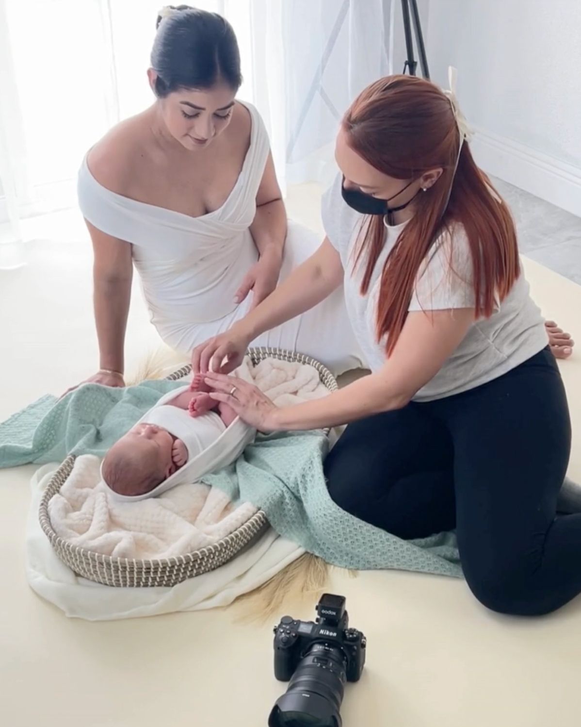 Step-by-step sequence showing a baby being gently placed on a changing mat and diapering process.