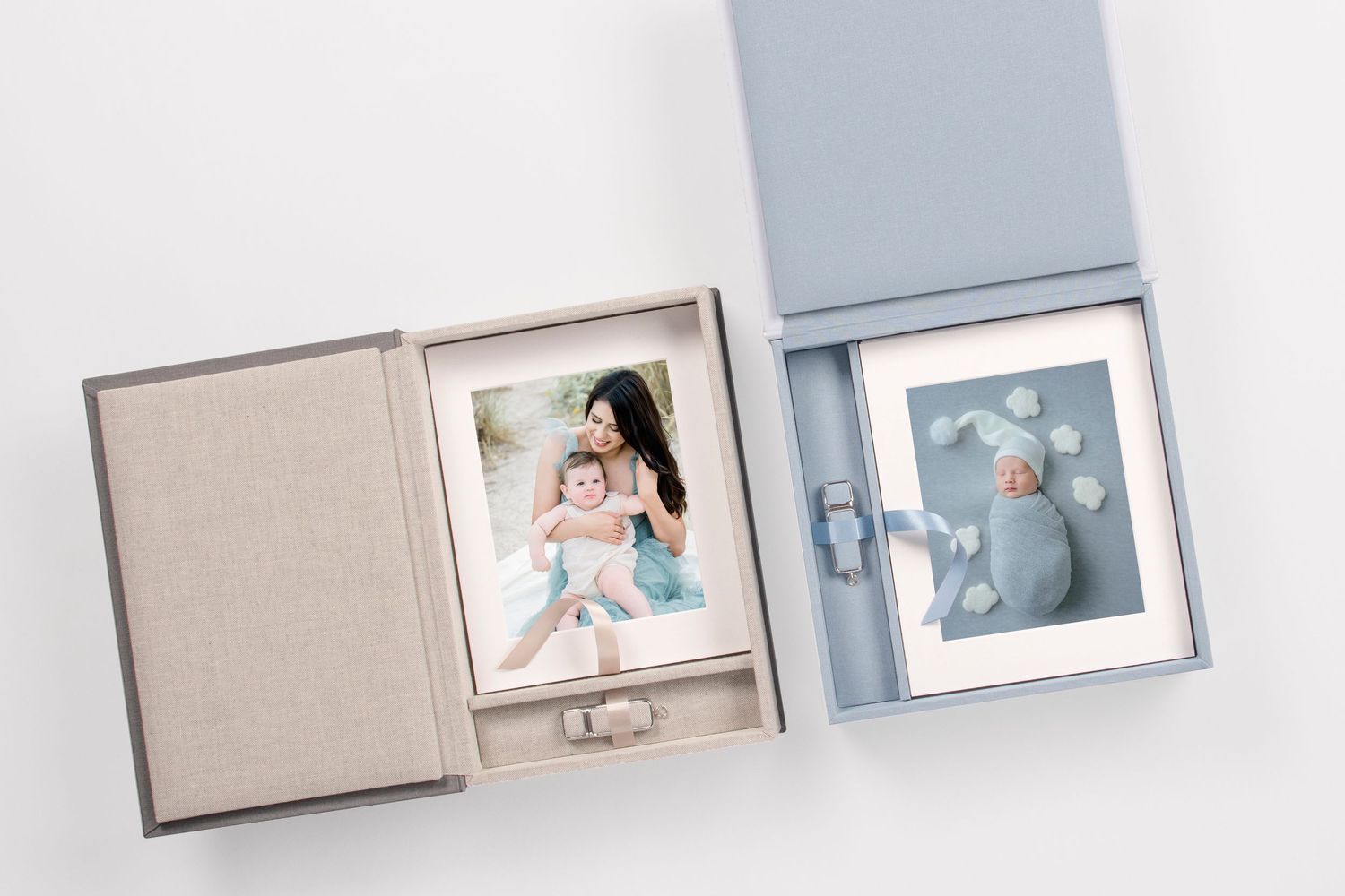 Two opened photo albums containing personal family pictures and memories in gray and blue tones.
