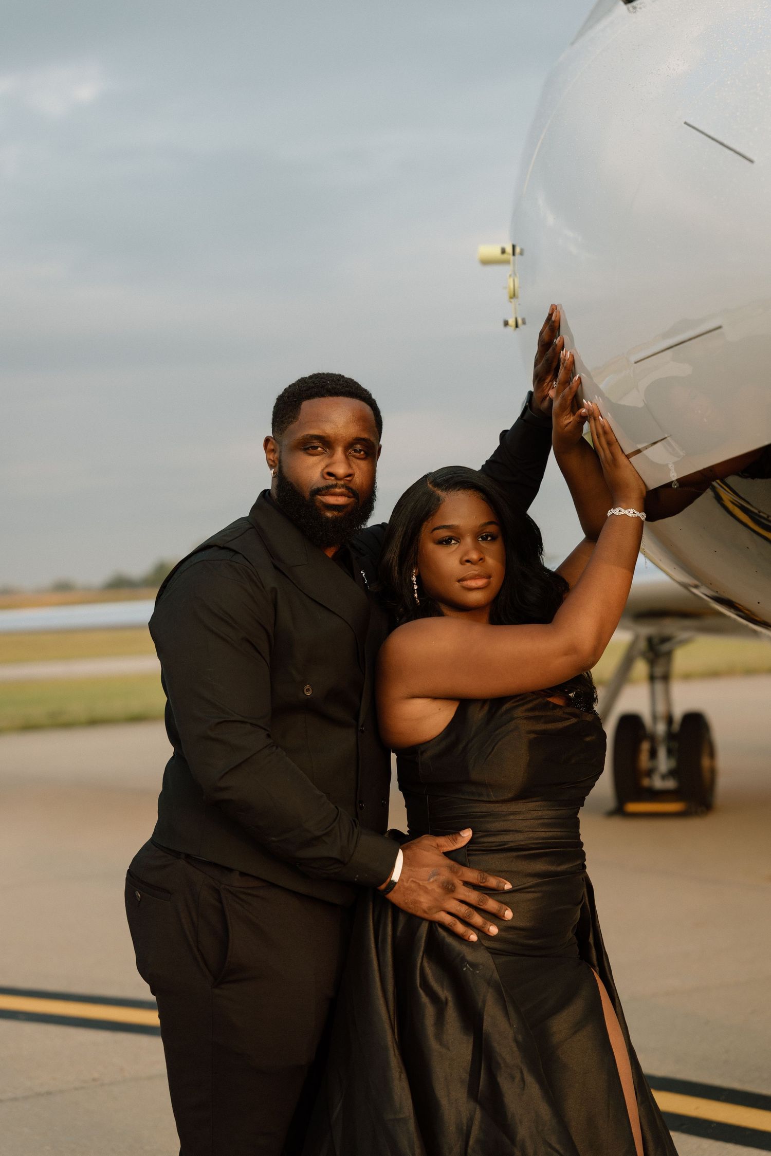 Documentary and editorial engagement photos during a romantic session at Indianapolis International Airport in Indianapolis, IN.