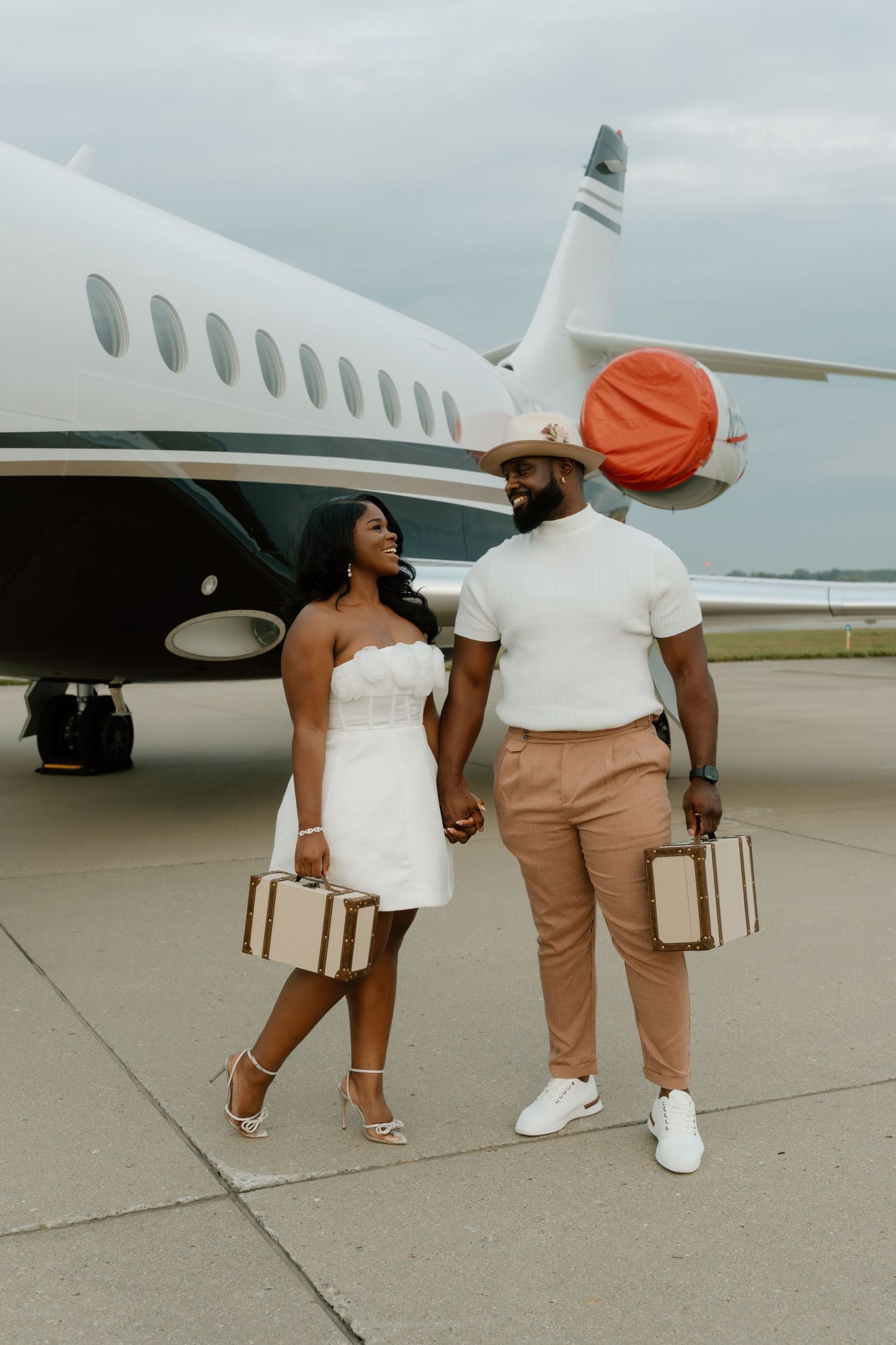 Documentary and editorial engagement photos during a romantic session at Indianapolis International Airport in Indianapolis, IN.