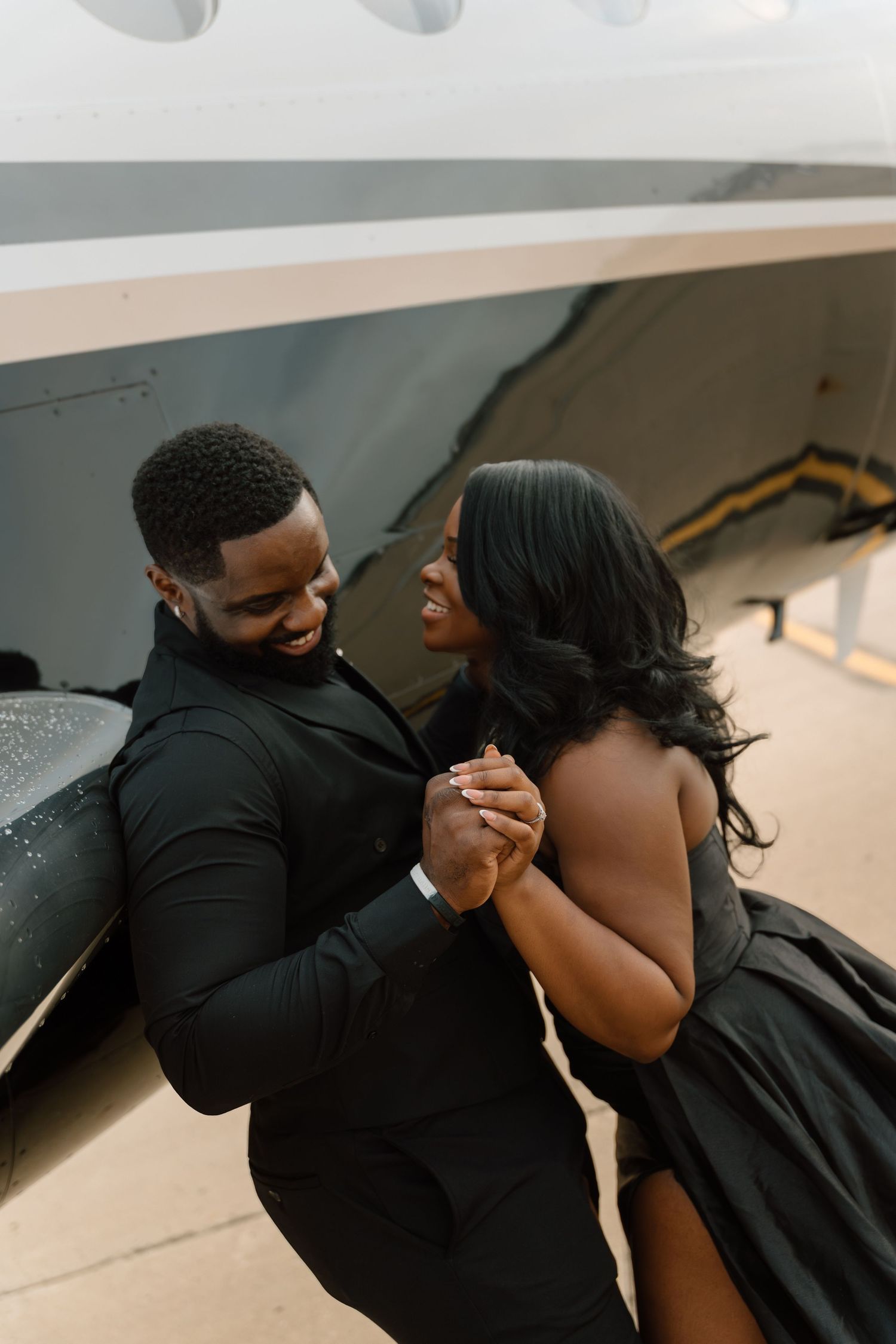 Documentary and editorial engagement photos during a romantic session at Indianapolis International Airport in Indianapolis, IN.