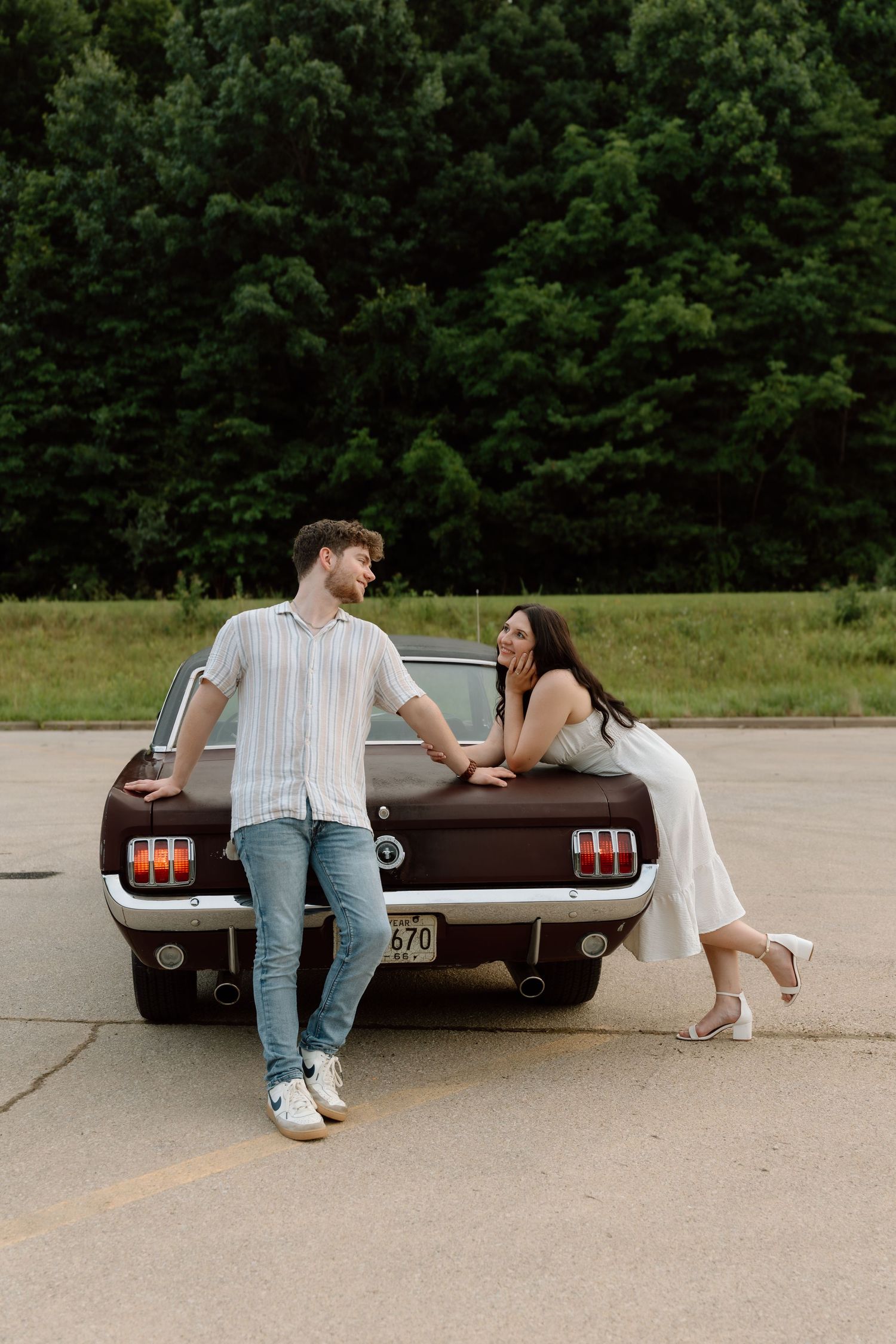 Vintage car engagement photos at Lake Monroe in Bloomington, Indiana.