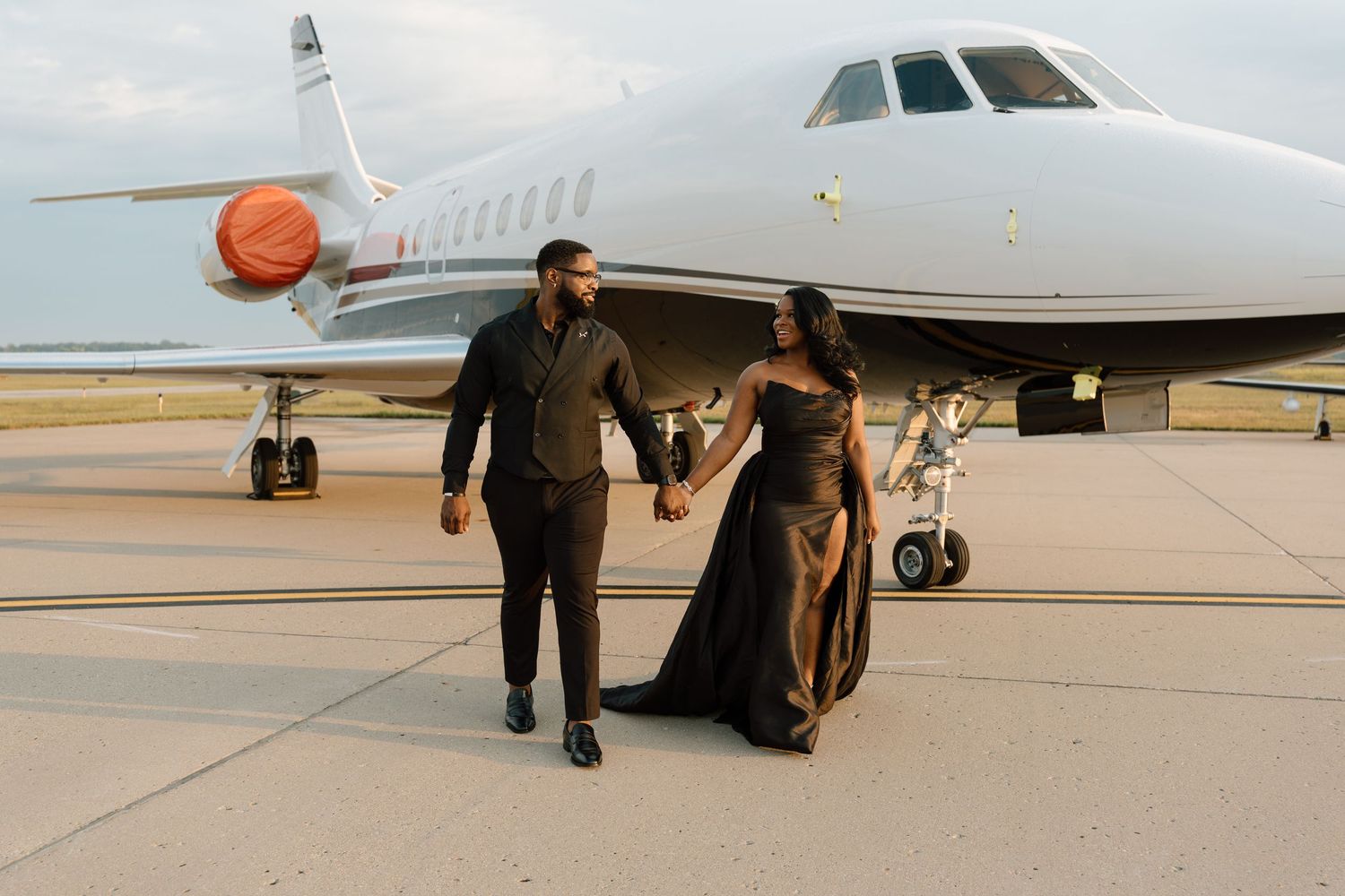 Documentary and editorial engagement photos during a romantic session at Indianapolis International Airport in Indianapolis, IN.