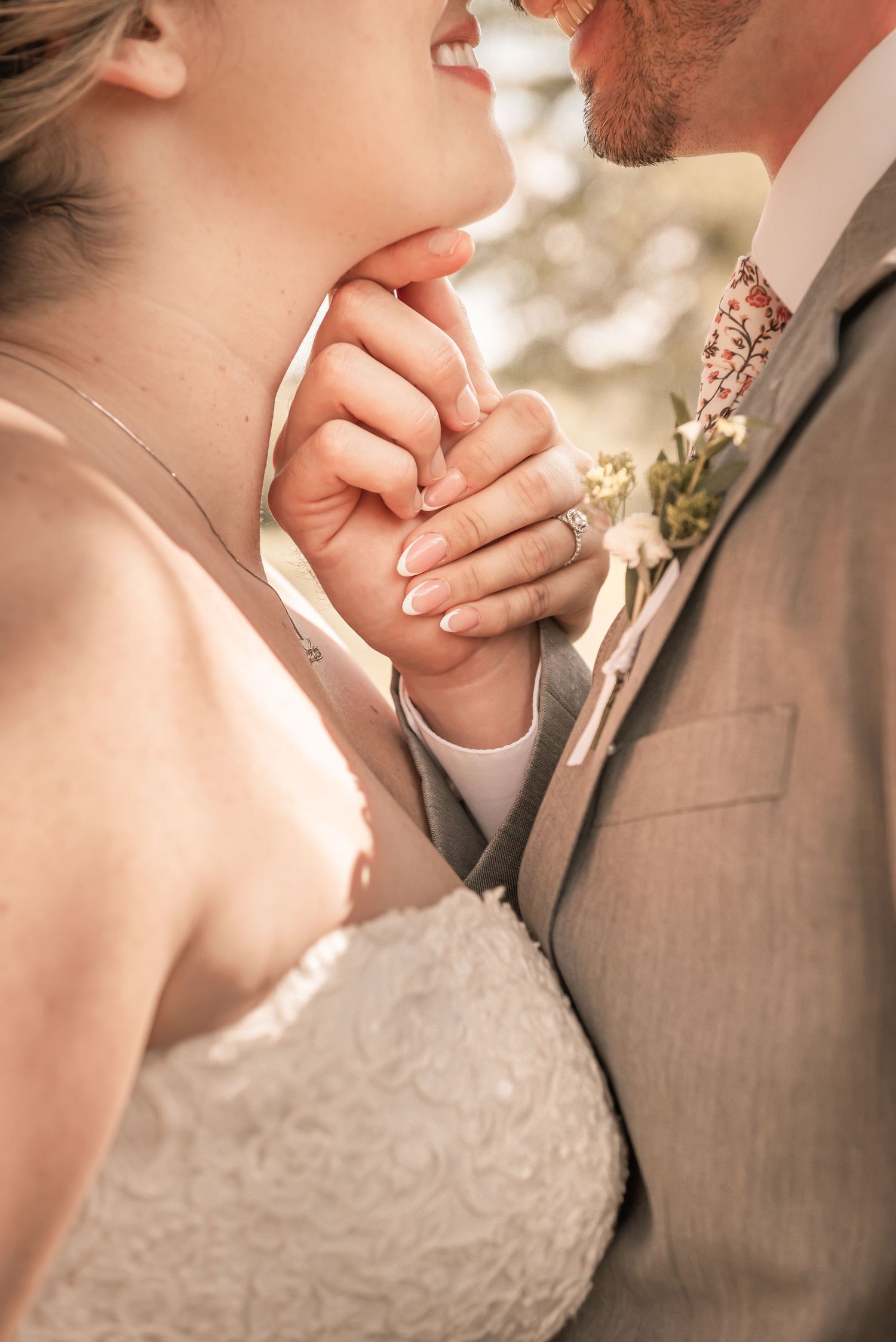 A tender moment between newlyweds showing romantic wedding day kisses captured in sequence with soft lighting.