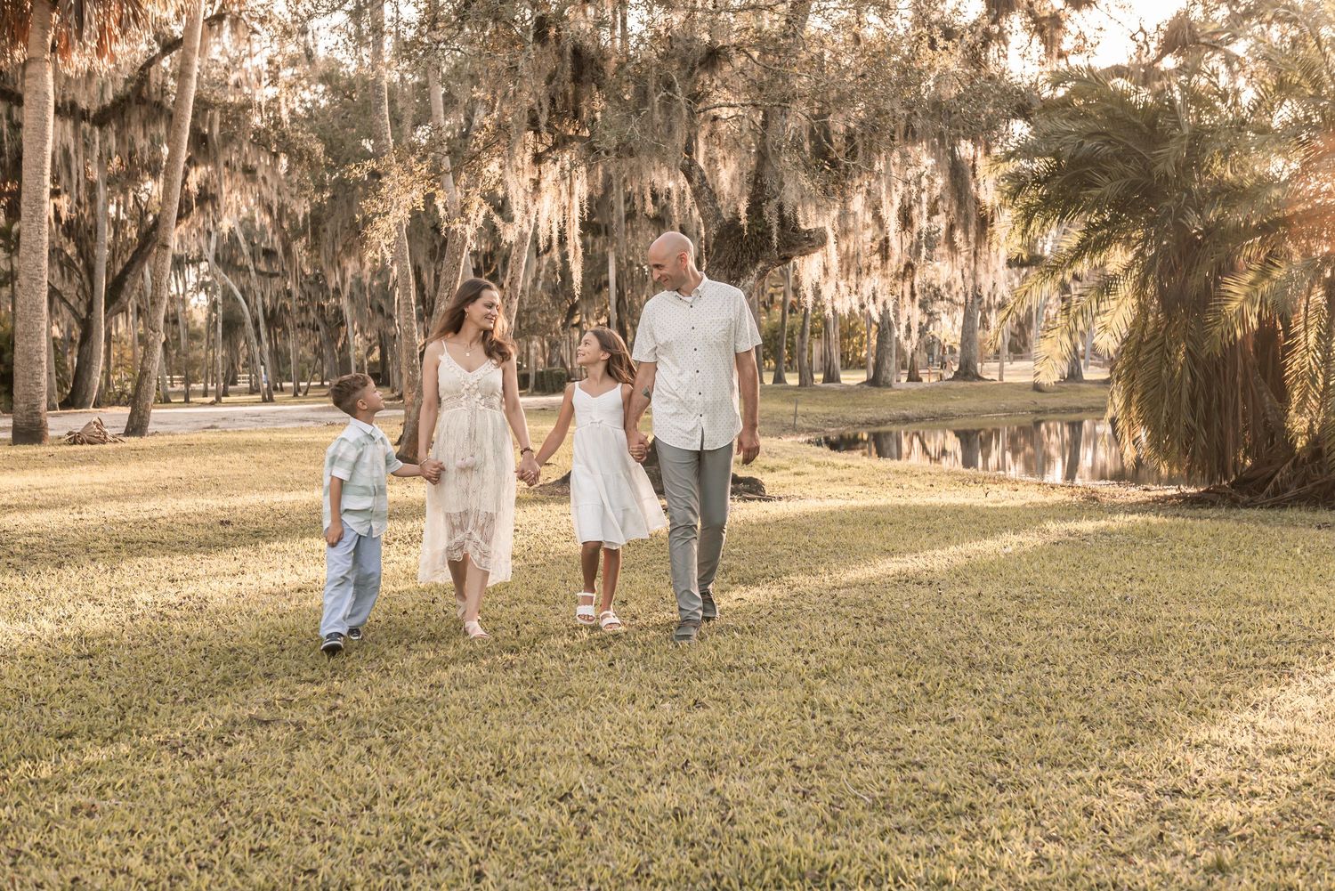 A series of candid photos showing people walking together in a park at sunset with golden light filtering through trees.