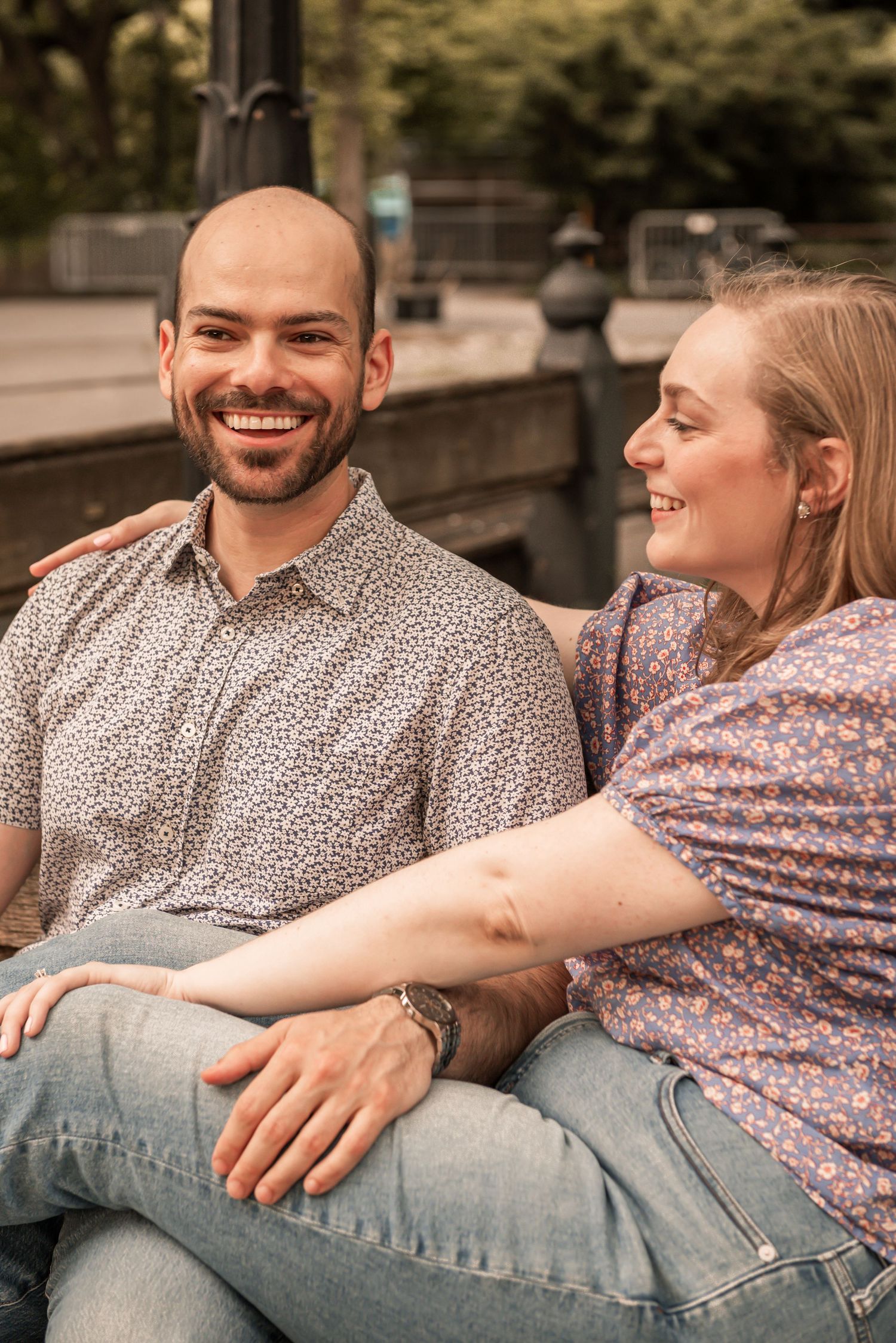 A couple lounges together outdoors on a sunny day wearing casual attire in four sequential photos.