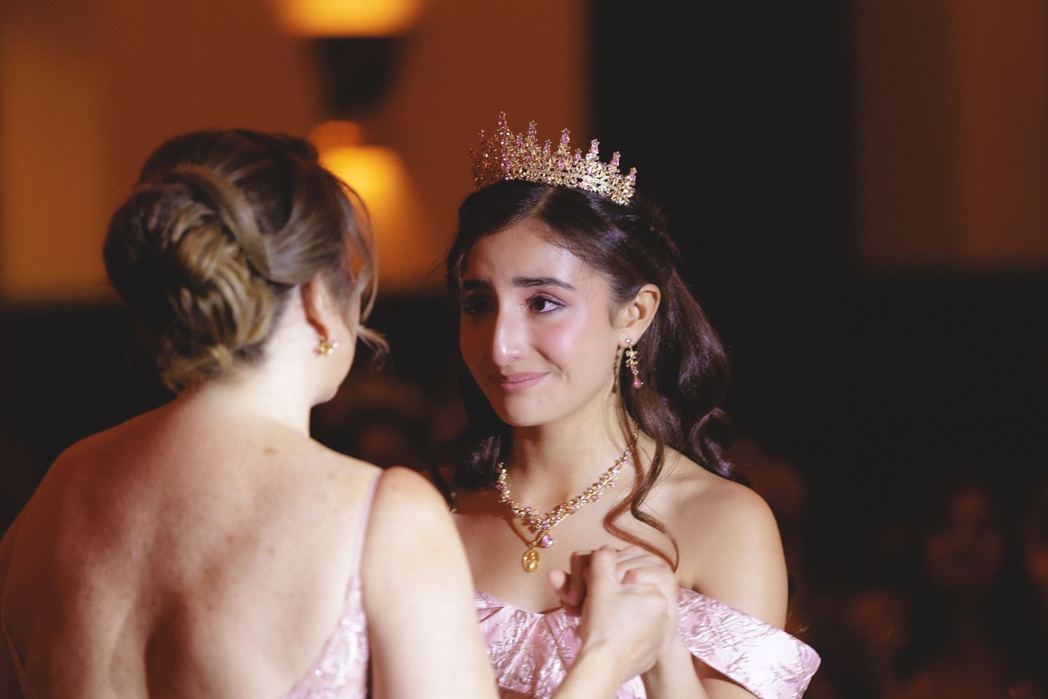 Five elegant formal event photos show intimate dancing moments between formal-attired couples under warm lighting.