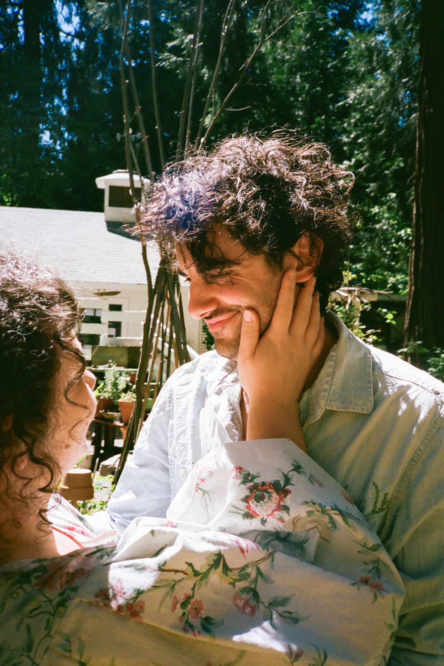 Romantic vintage-style portrait with soft lighting and floral details.