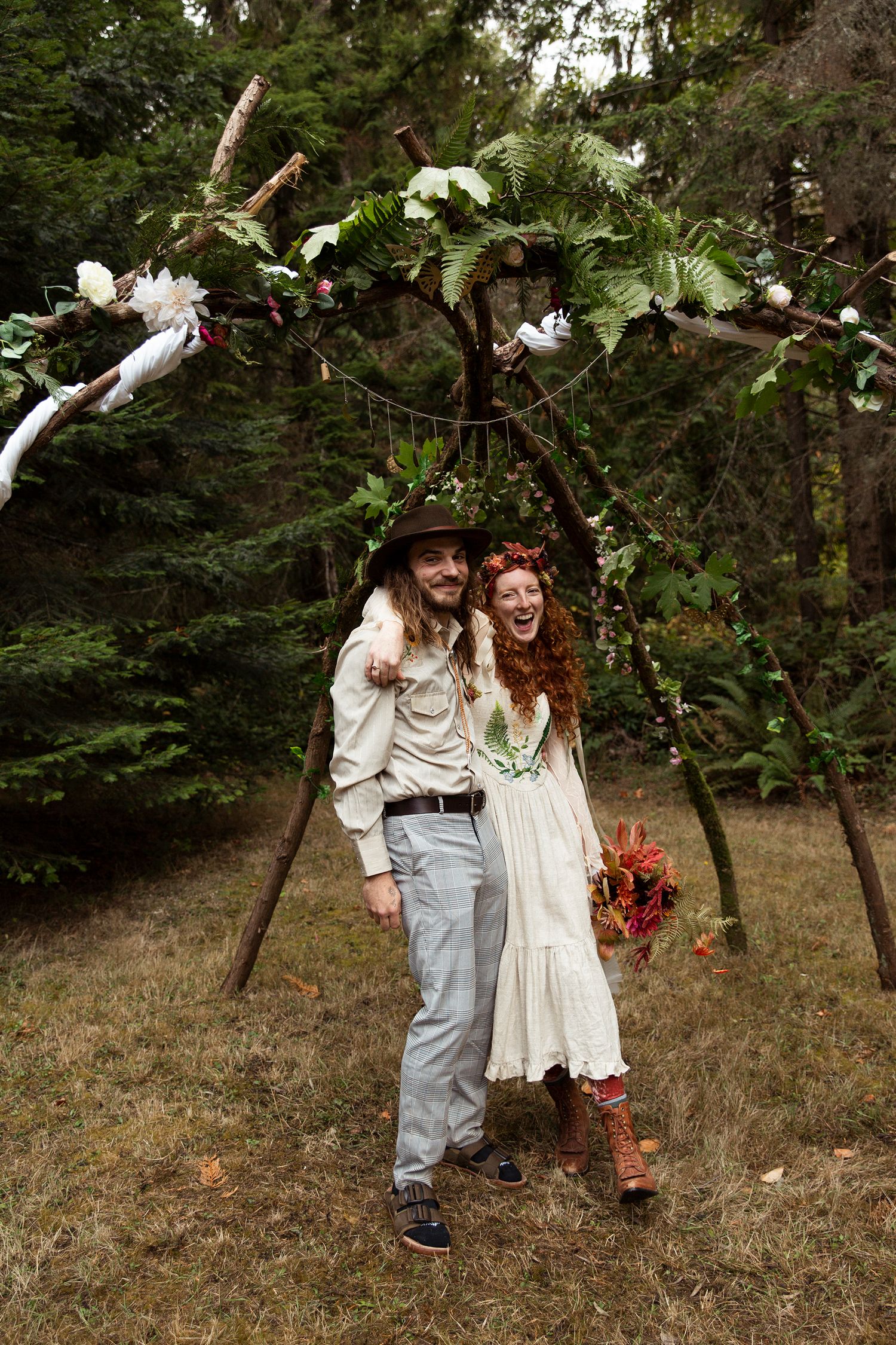 Candid moments of laughter in a sunlit forest setting.