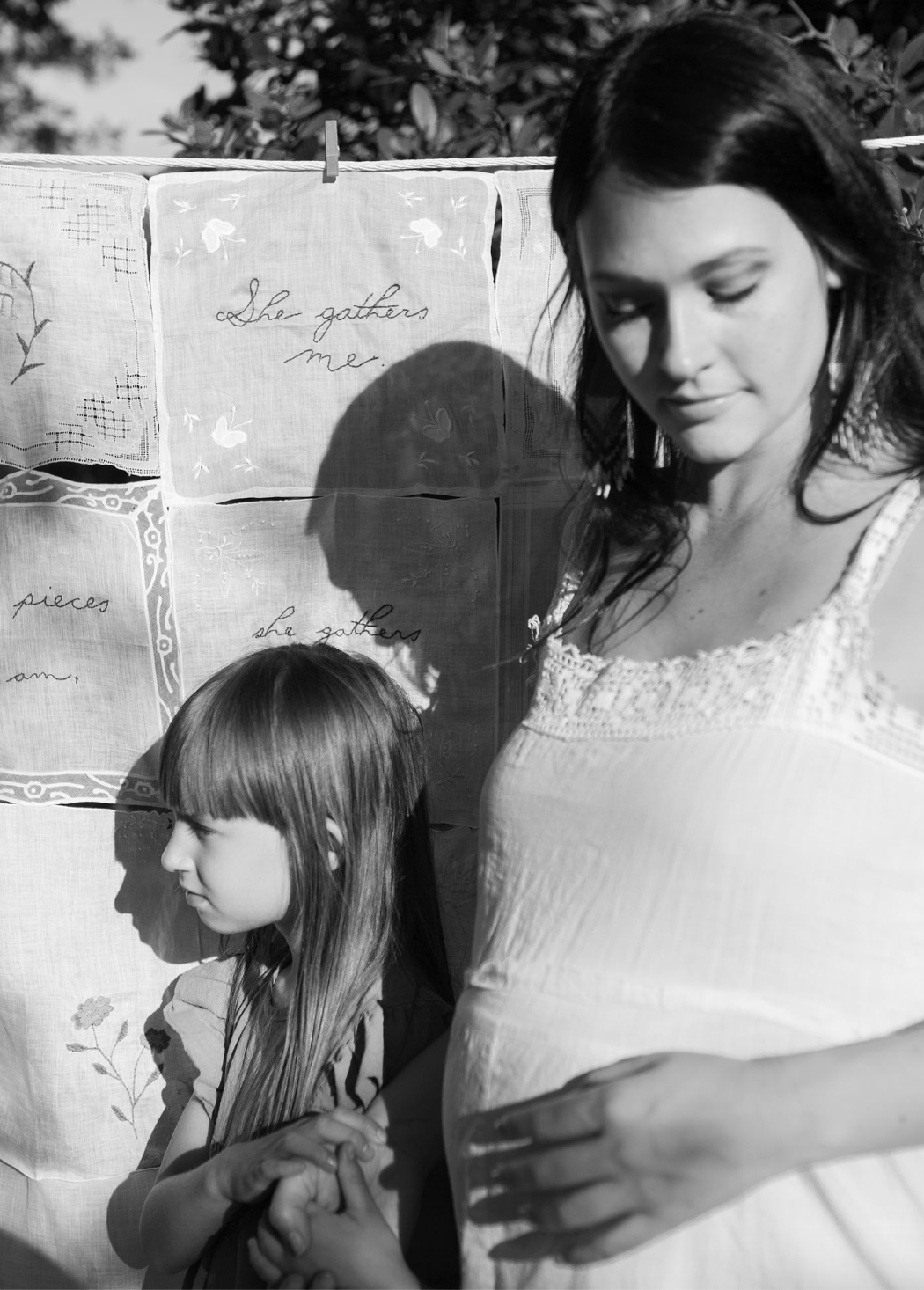 Black and white candid moments captured against a textured wall.
