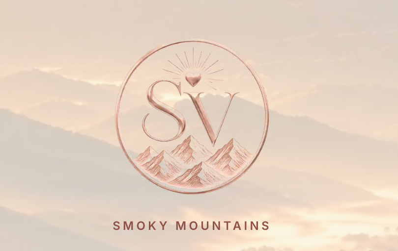 Rose gold SV monogram logo with mountain peaks and sun rays inside a circle, Smoky Mountains branding design.