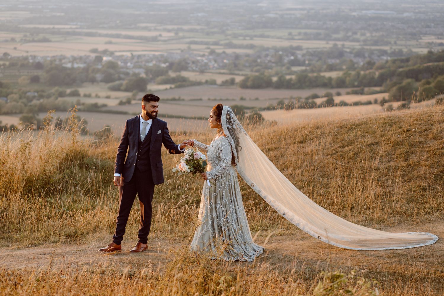 Golden hour proposal photography at Crickley Hill.