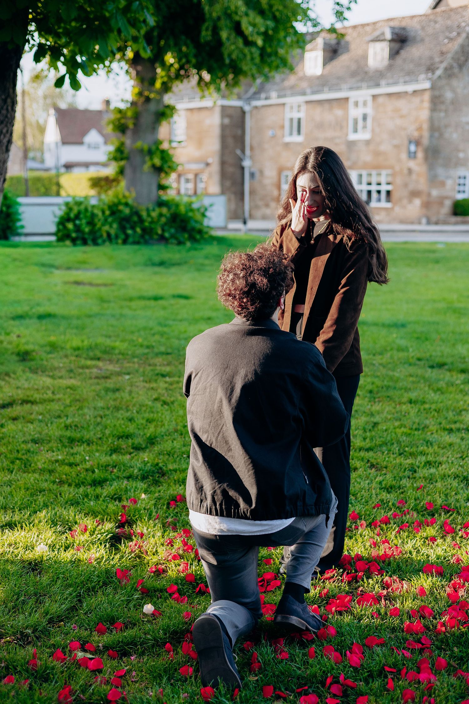 Romantic engagement photos in Broadway after a surprise proposal.